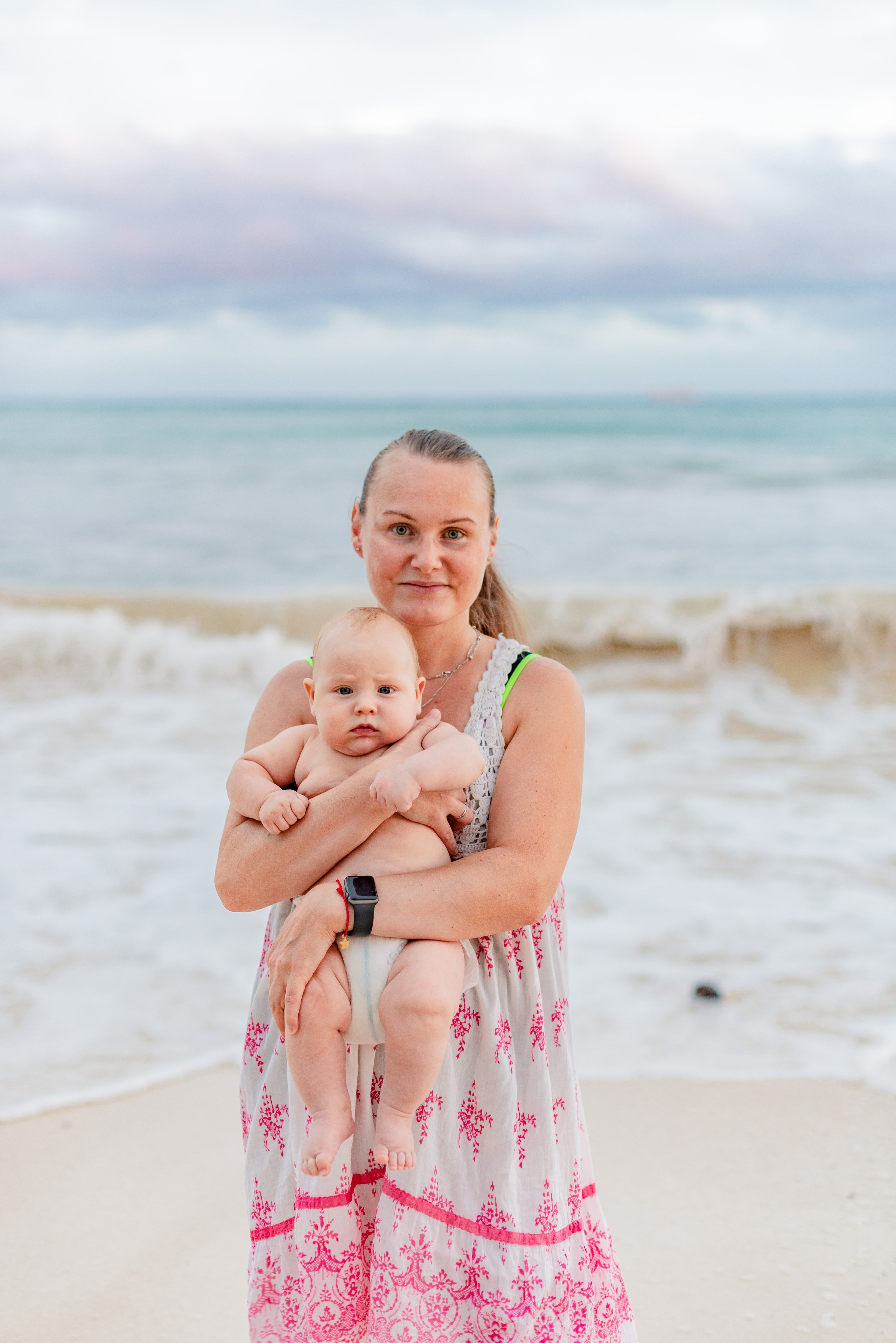 A family walk on the beach. PHOTOGRAPHER QUINTANA ROO