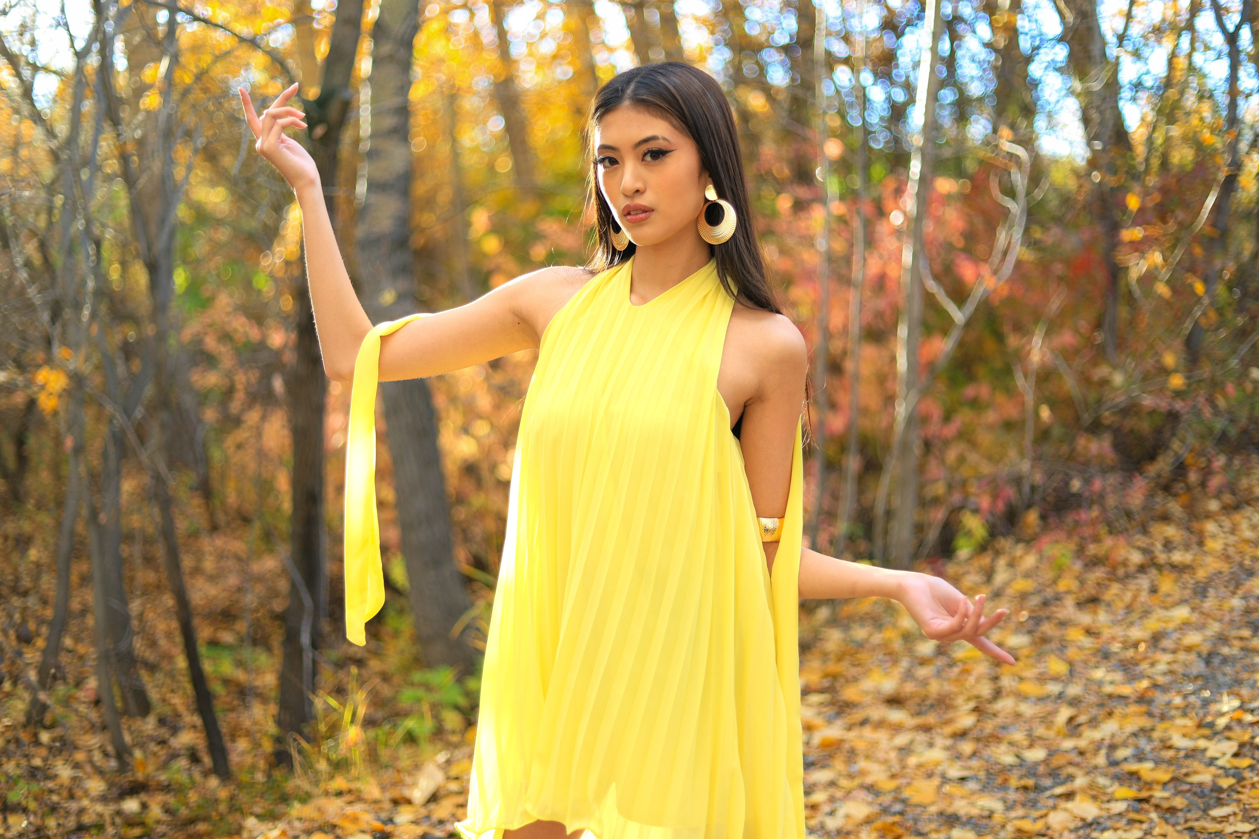 Golden Elegance: Lana Collantes’ Autumn Photoshoot in a Yellow Dress. ProFly Media Inc. — Cinematic photo and video production for brands, businesses, and spaces in Calgary