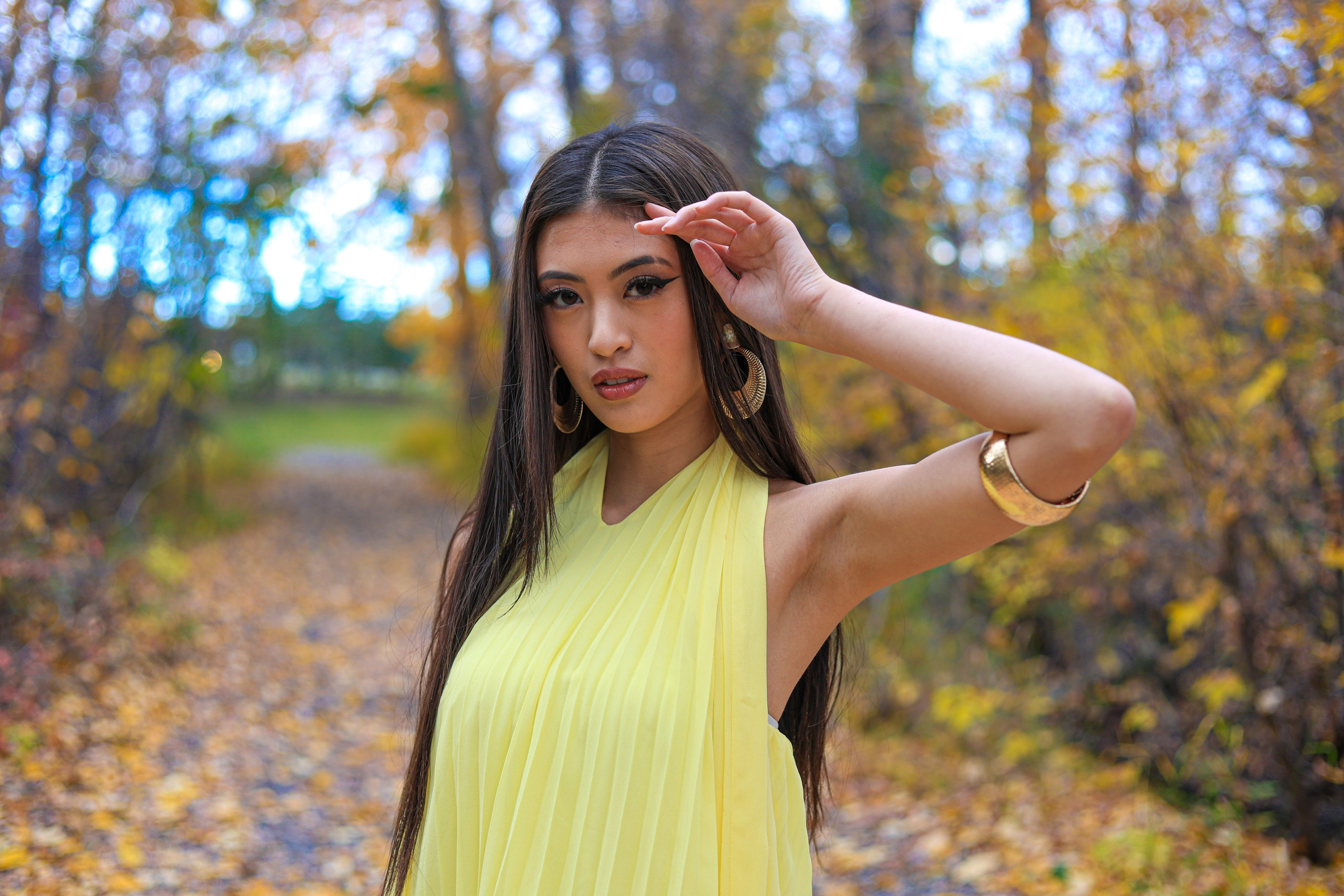 Golden Elegance: Lana Collantes’ Autumn Photoshoot in a Yellow Dress. ProFly Media Inc. — Cinematic photo and video production for brands, businesses, and spaces in Calgary