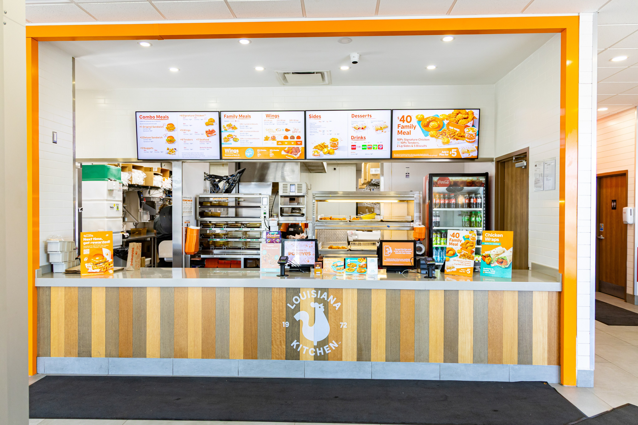 Capturing Flavor — Interior Photo Shoot for Popeyes. ProFly Media Inc. — Cinematic photo and video production for brands, businesses, and spaces in Calgary