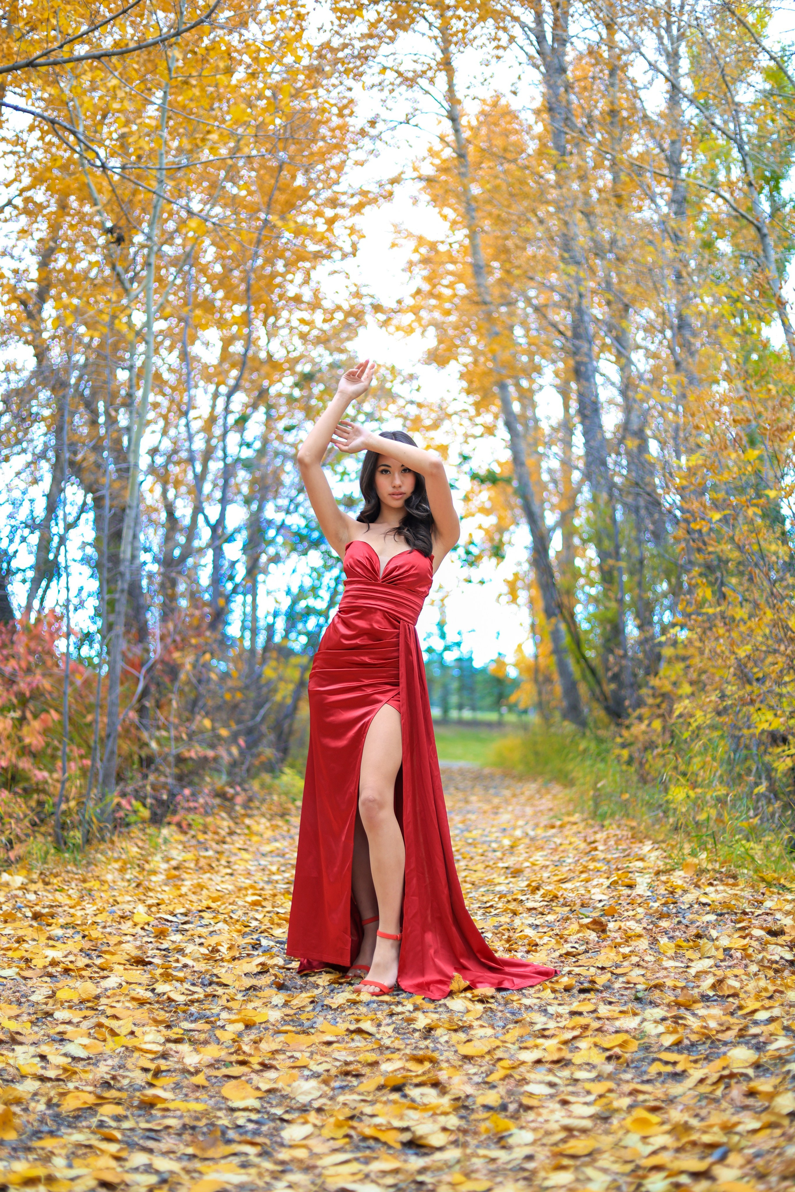 Autumn Elegance: Sidney Jean Victoria in a Red Dress. ProFly Media Inc. — Cinematic photo and video production for brands, businesses, and spaces in Calgary