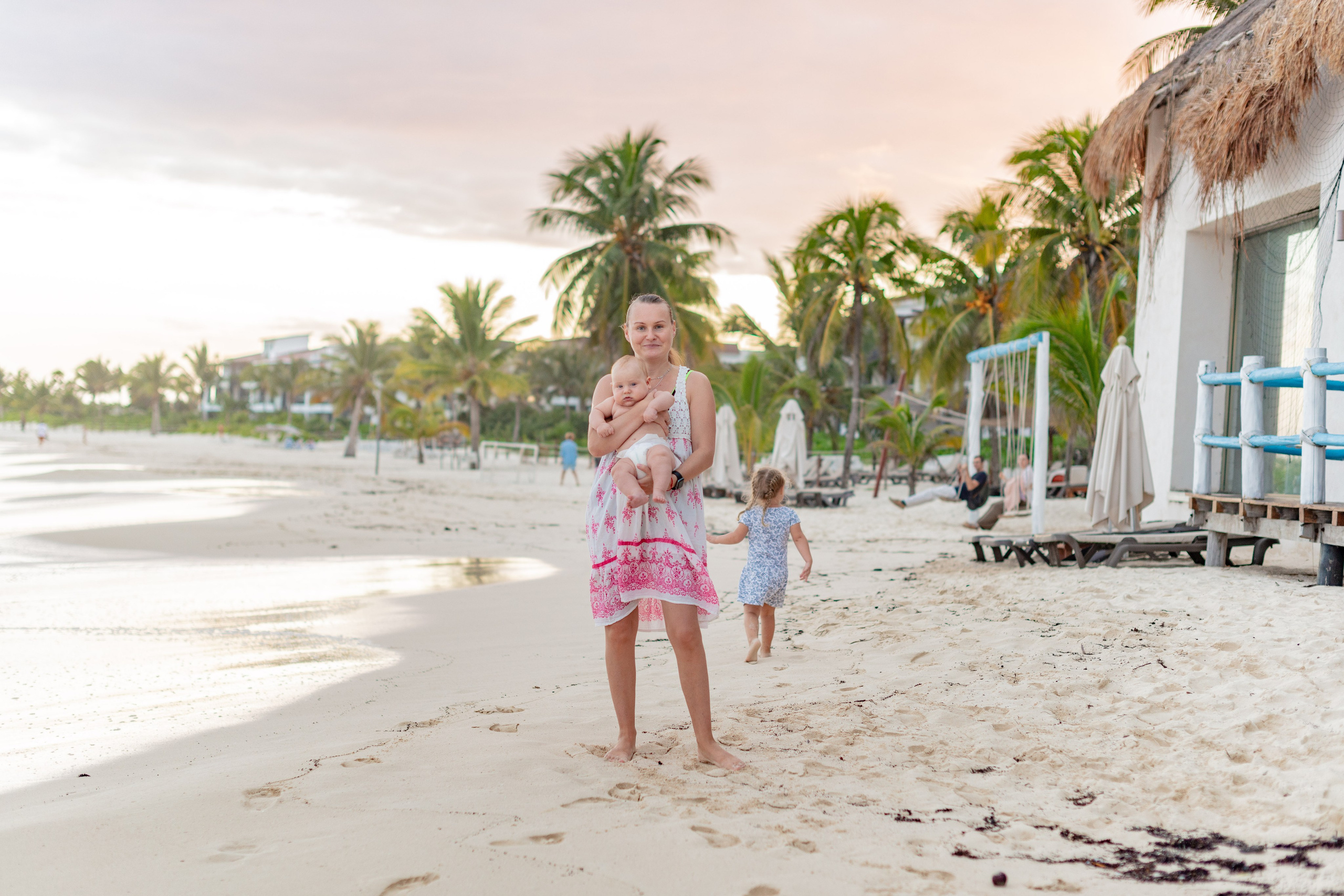A family walk on the beach. PHOTOGRAPHER QUINTANA ROO