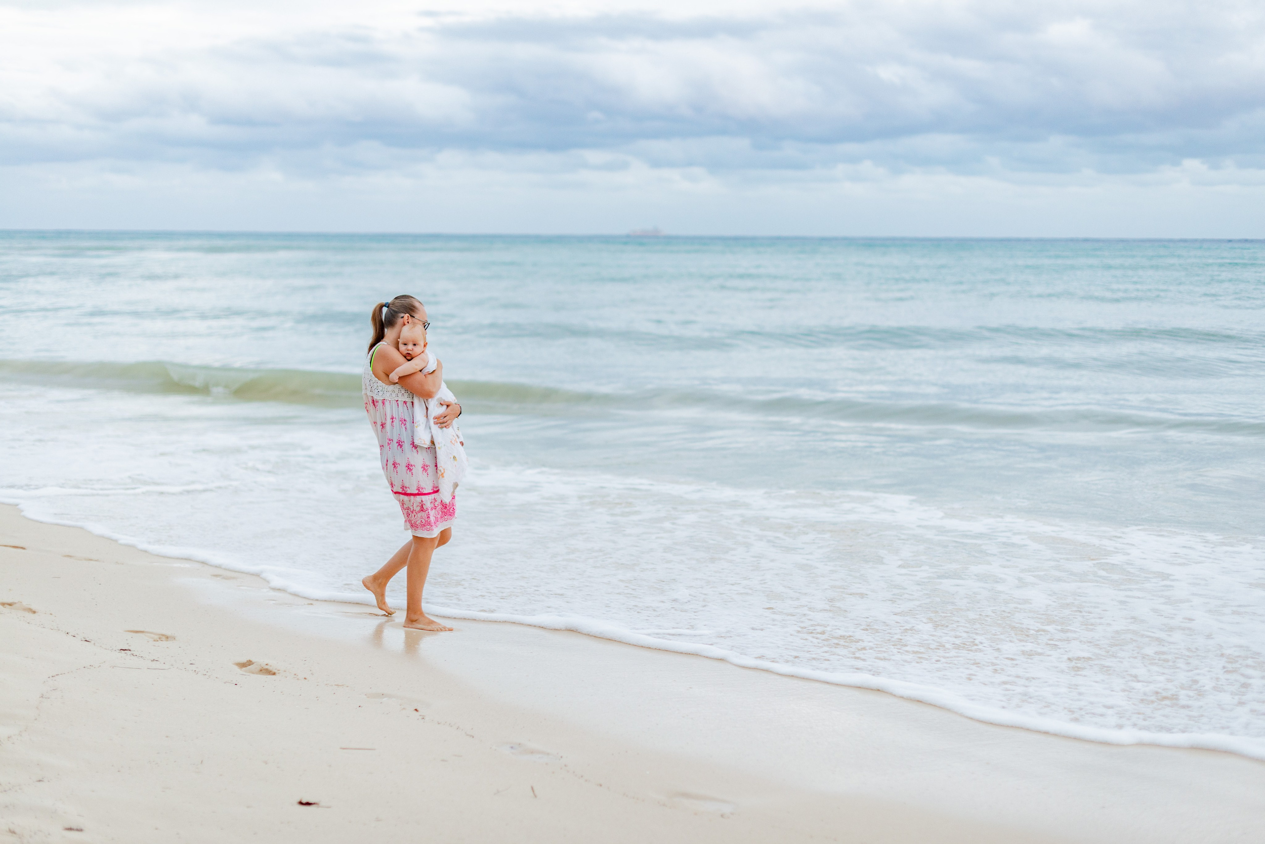 A family walk on the beach. PHOTOGRAPHER QUINTANA ROO
