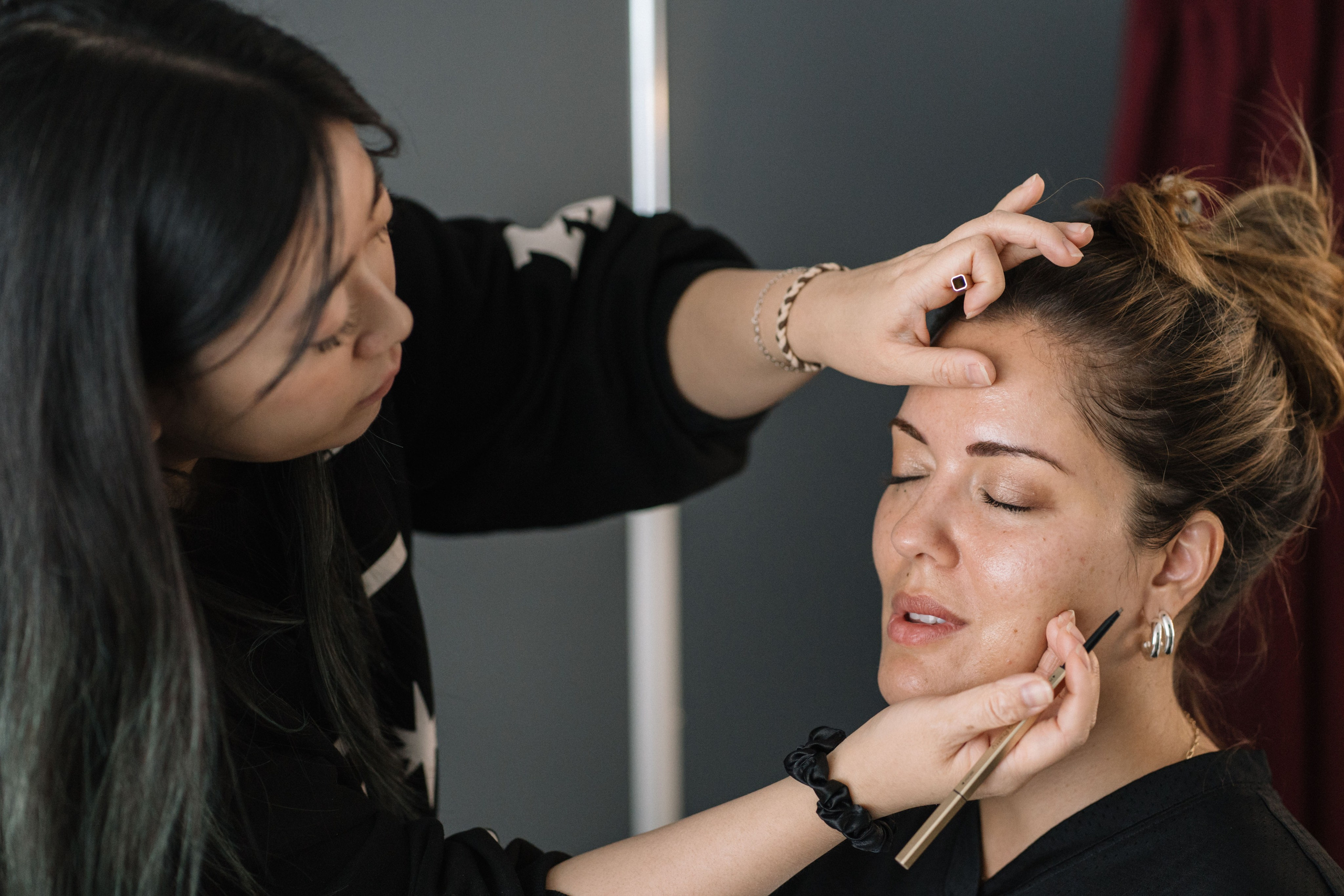 Professional makeup application for executive headshot session with Burnaby personal branding photographer