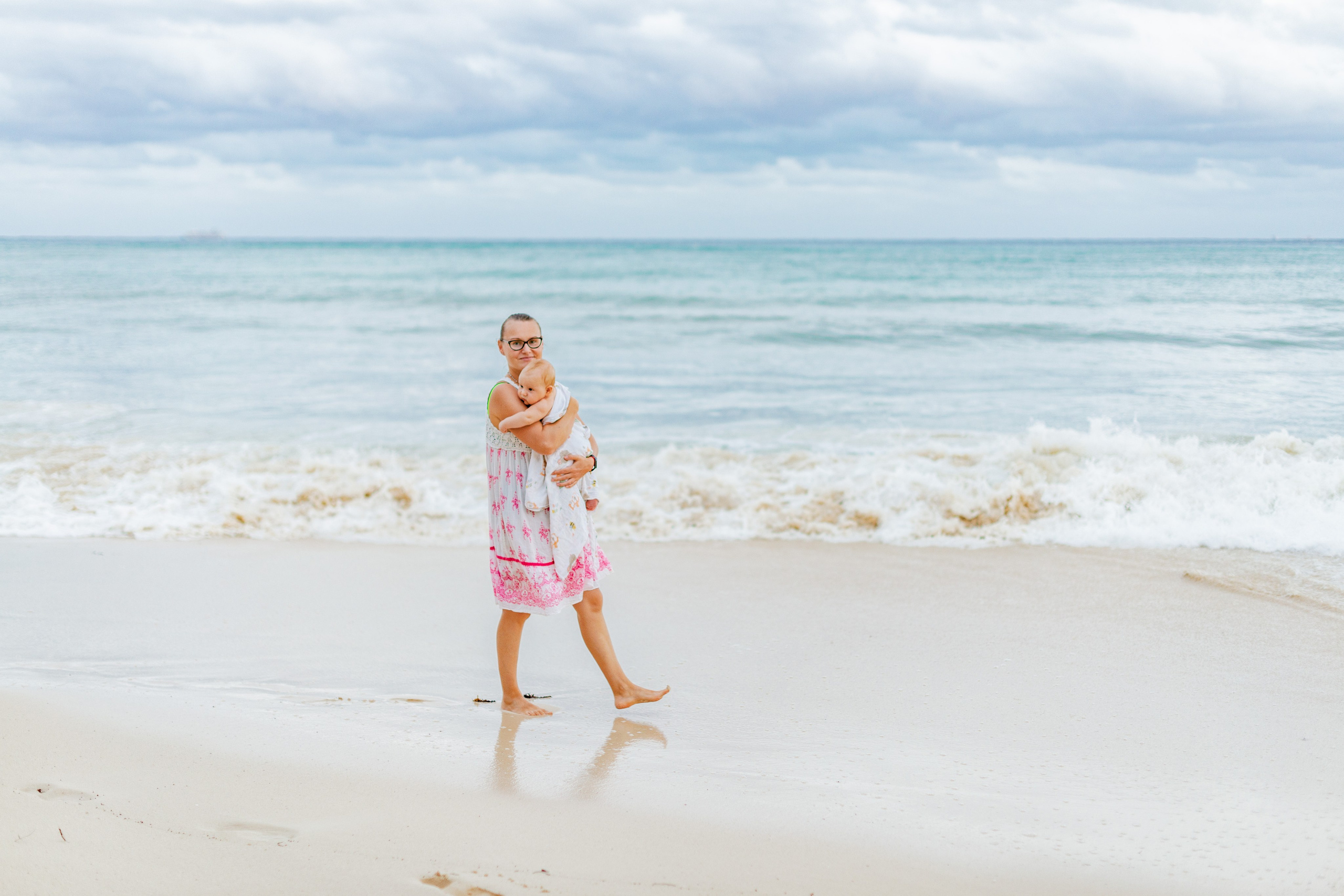 A family walk on the beach. PHOTOGRAPHER QUINTANA ROO