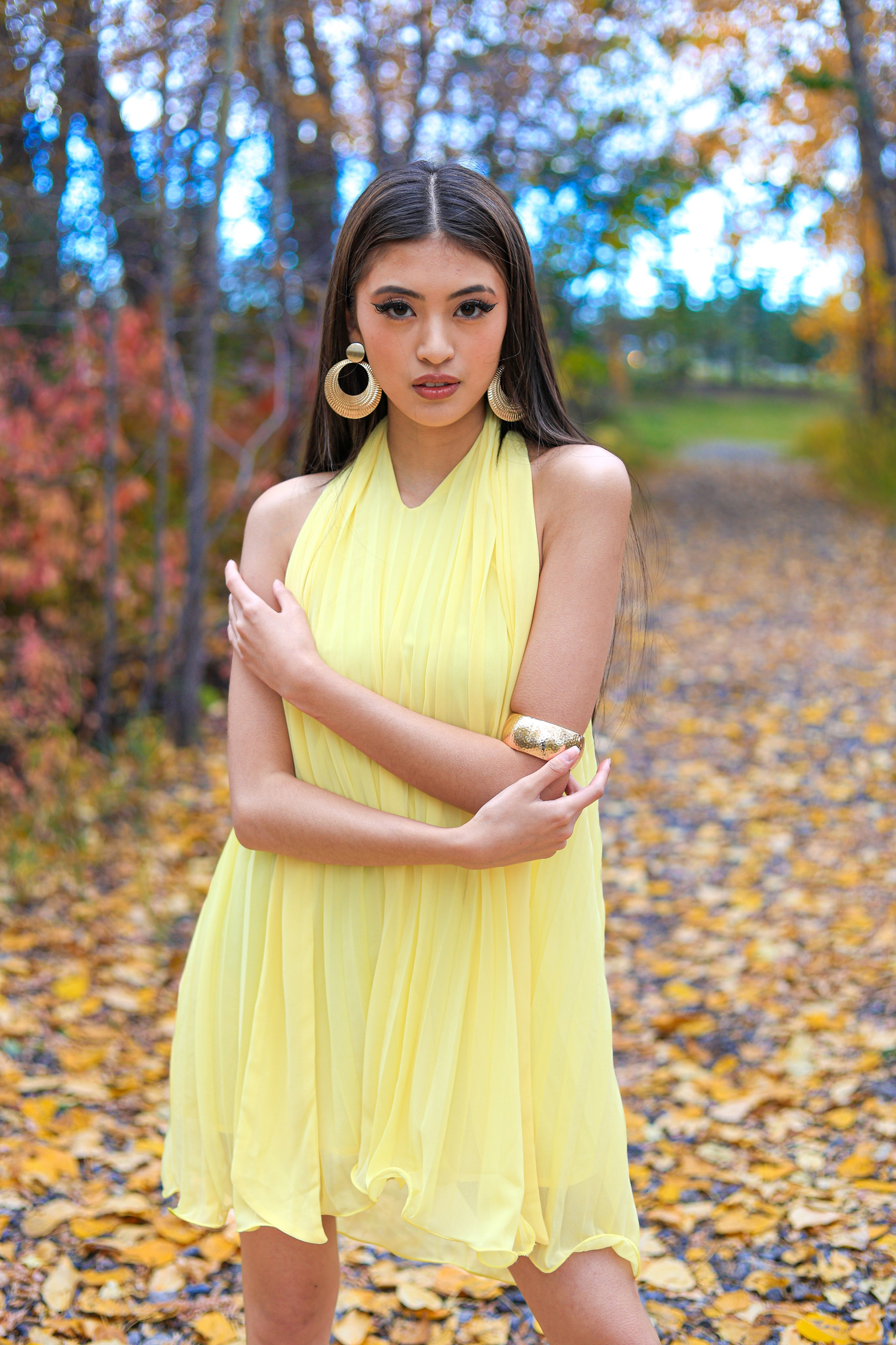 Golden Elegance: Lana Collantes’ Autumn Photoshoot in a Yellow Dress. ProFly Media Inc. — Cinematic photo and video production for brands, businesses, and spaces in Calgary