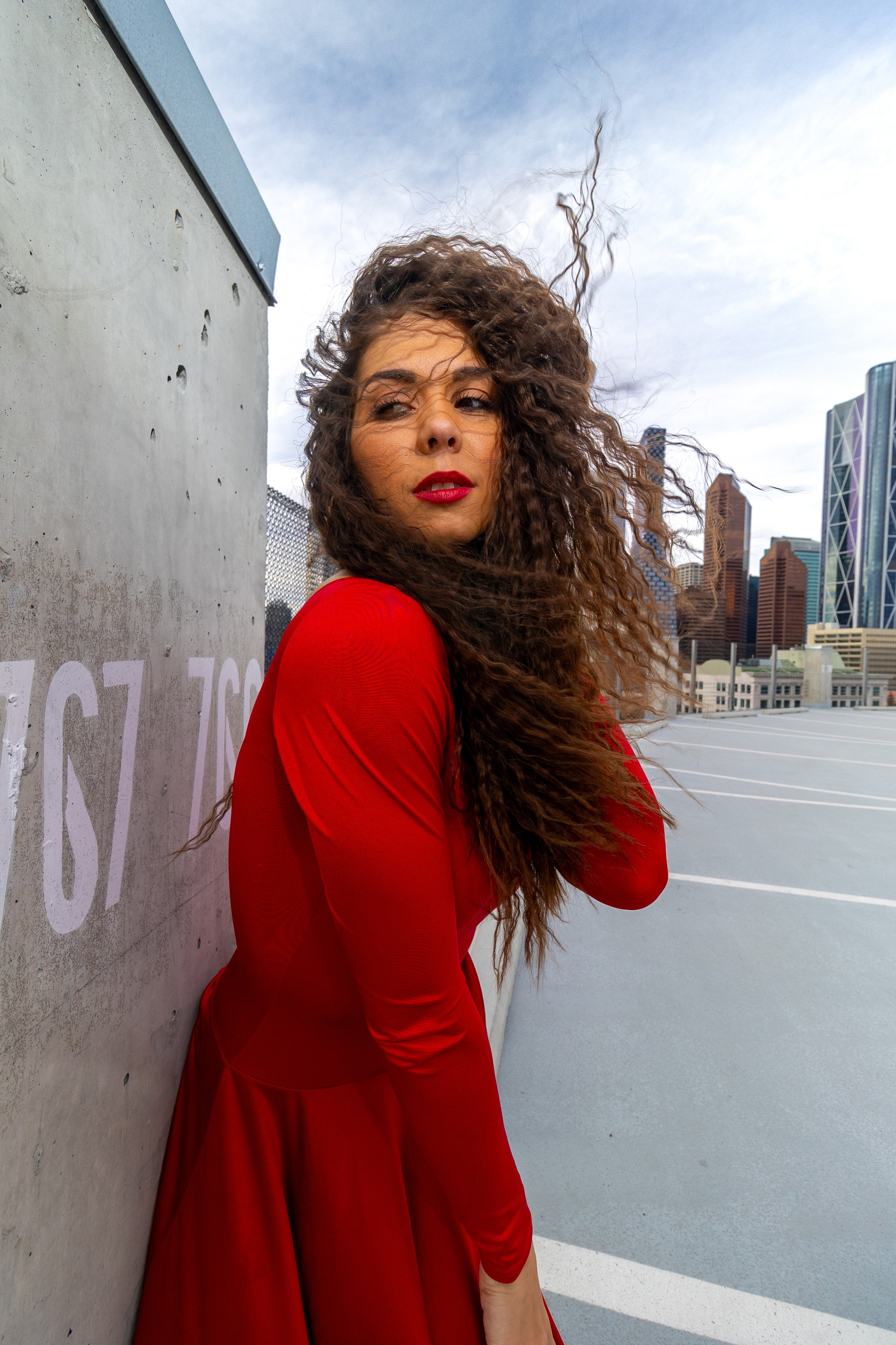 Radiant Elegance: Pamela’s Breathtaking Photoshoot in Red. ProFly Media Inc. — Cinematic photo and video production for brands, businesses, and spaces in Calgary