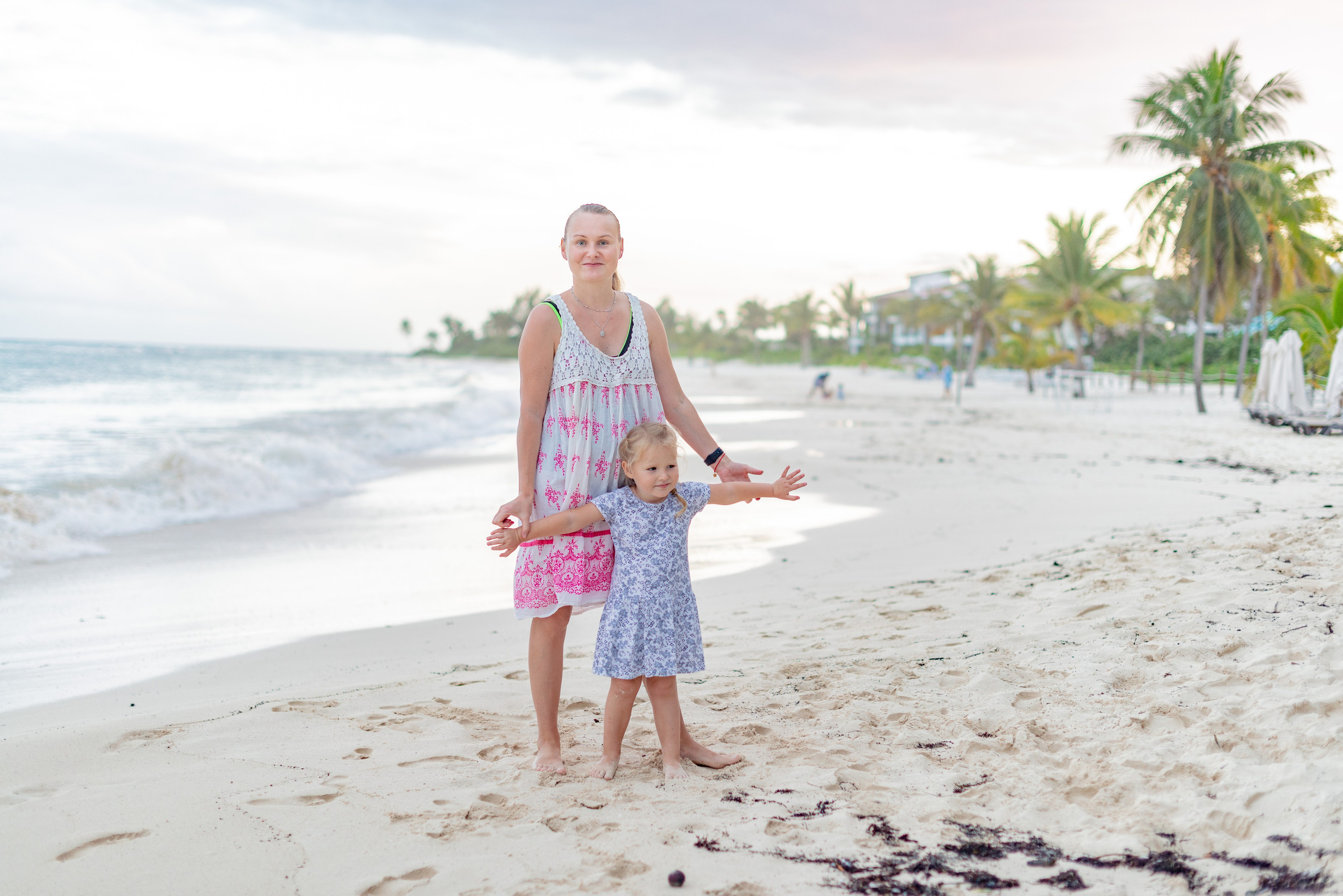 A family walk on the beach. PHOTOGRAPHER QUINTANA ROO