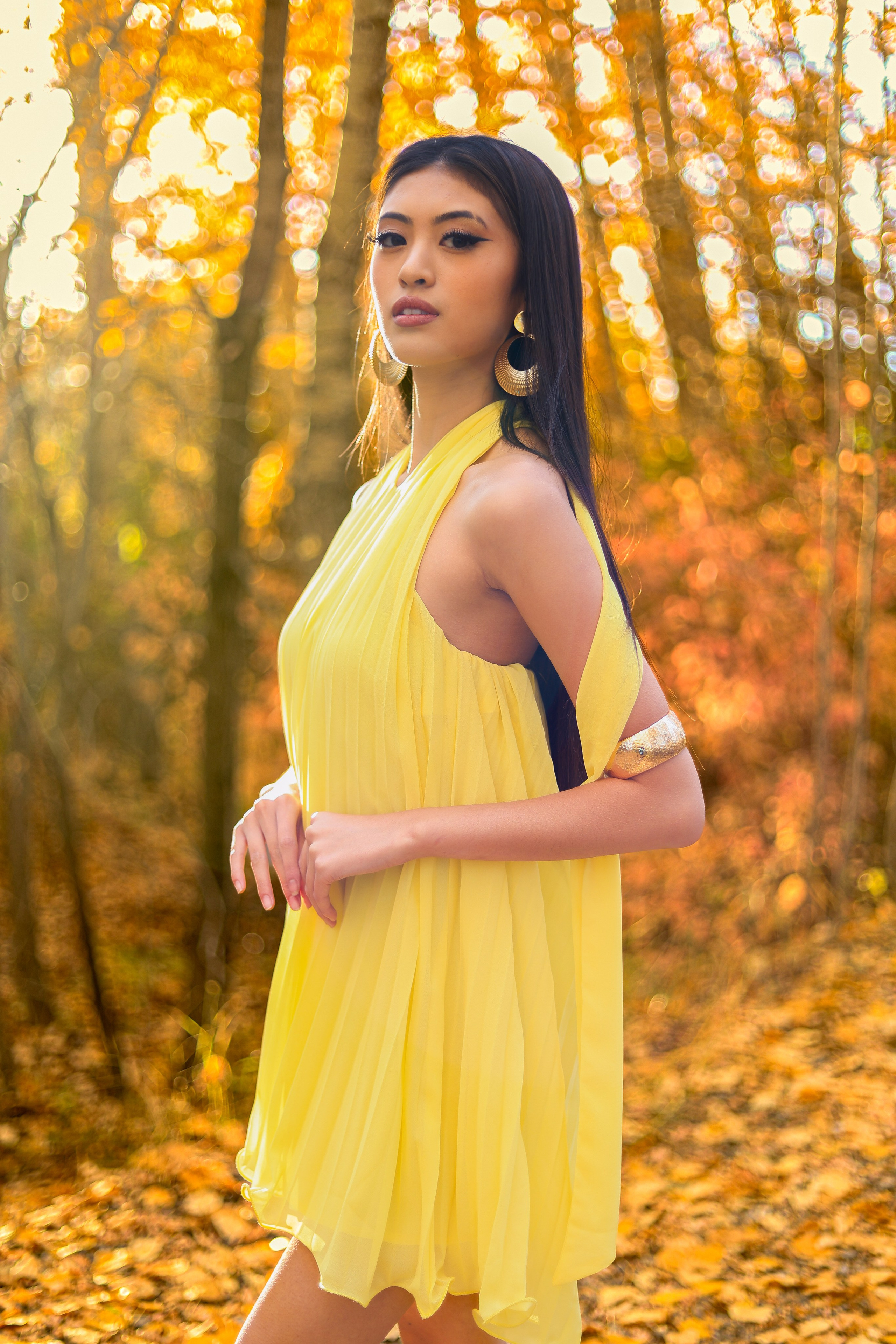 Golden Elegance: Lana Collantes’ Autumn Photoshoot in a Yellow Dress. ProFly Media Inc. — Cinematic photo and video production for brands, businesses, and spaces in Calgary