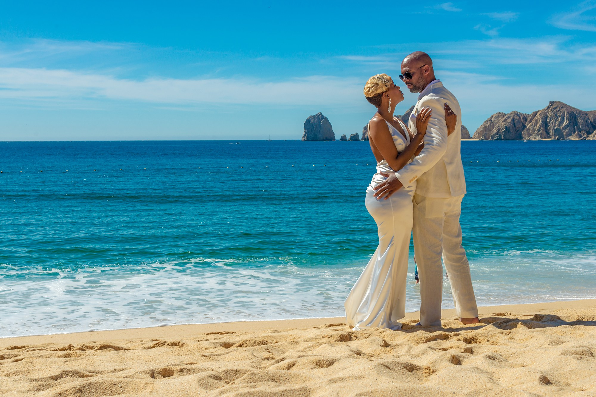Bride and groom portrait by the Sea of Cortez in Cabo San Lucas