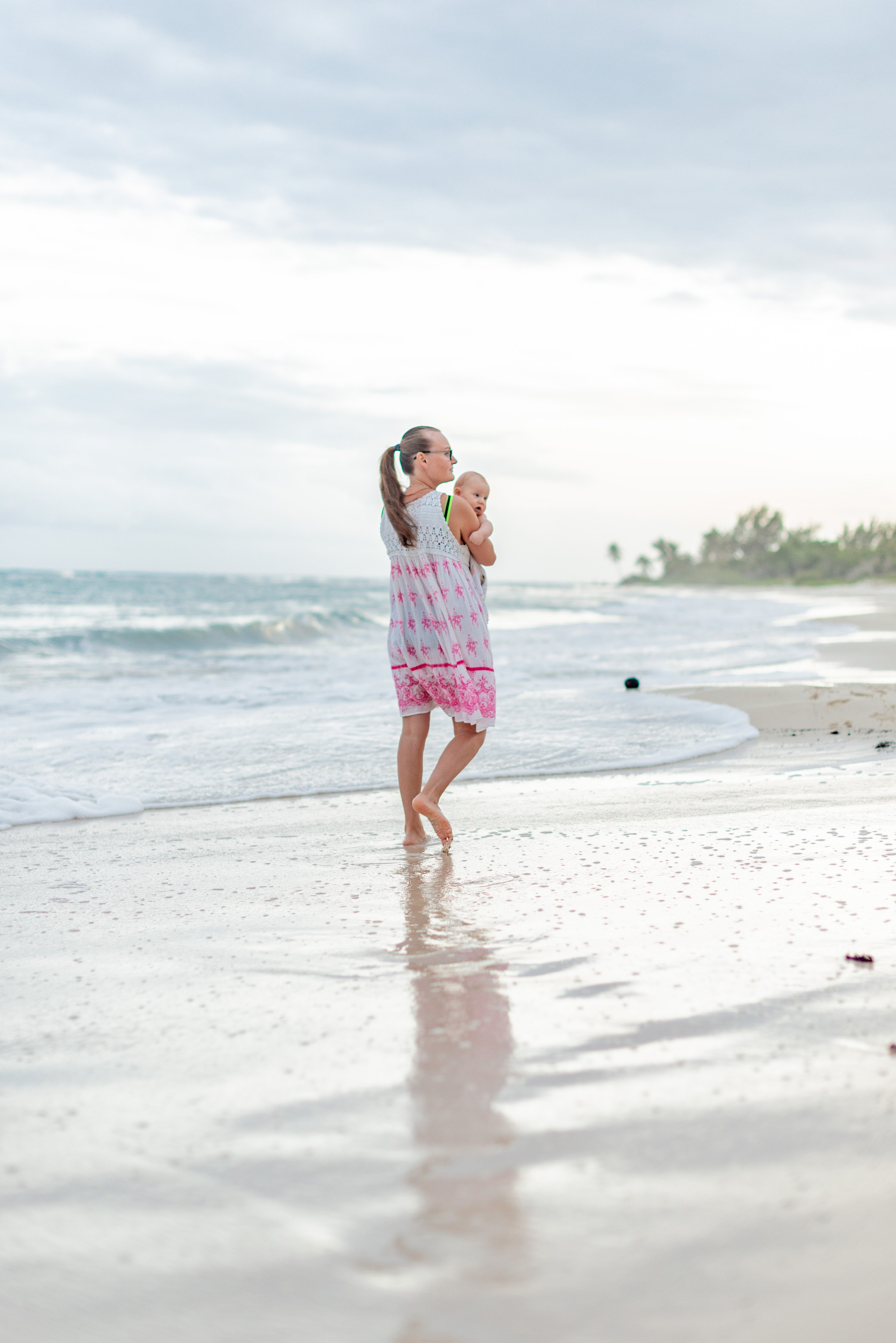 A family walk on the beach. PHOTOGRAPHER QUINTANA ROO