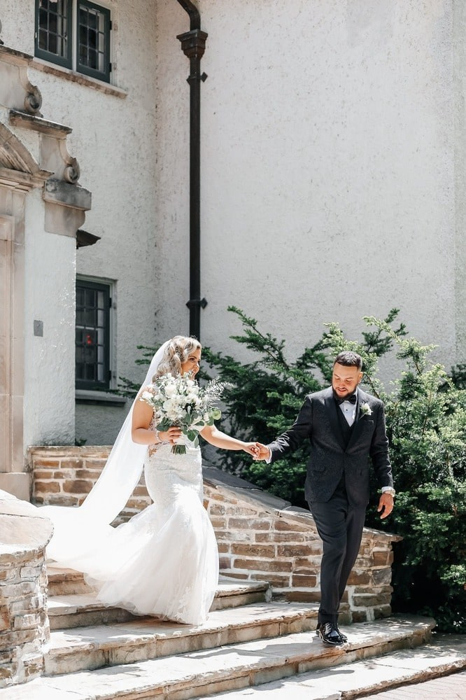 Candid moments of the bride and groom exchanging vows during their Newmarket ceremony.