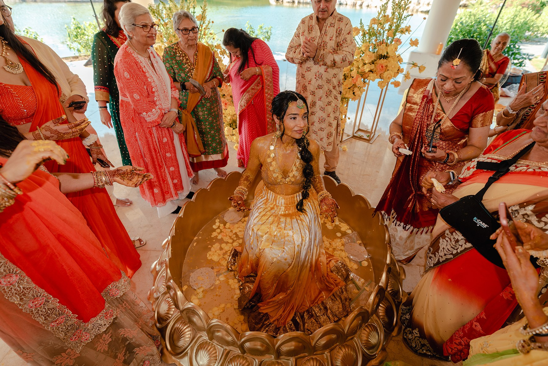 Indian bride receiving blessings from family during Haldi ceremony at an Indian destination wedding in Mexico