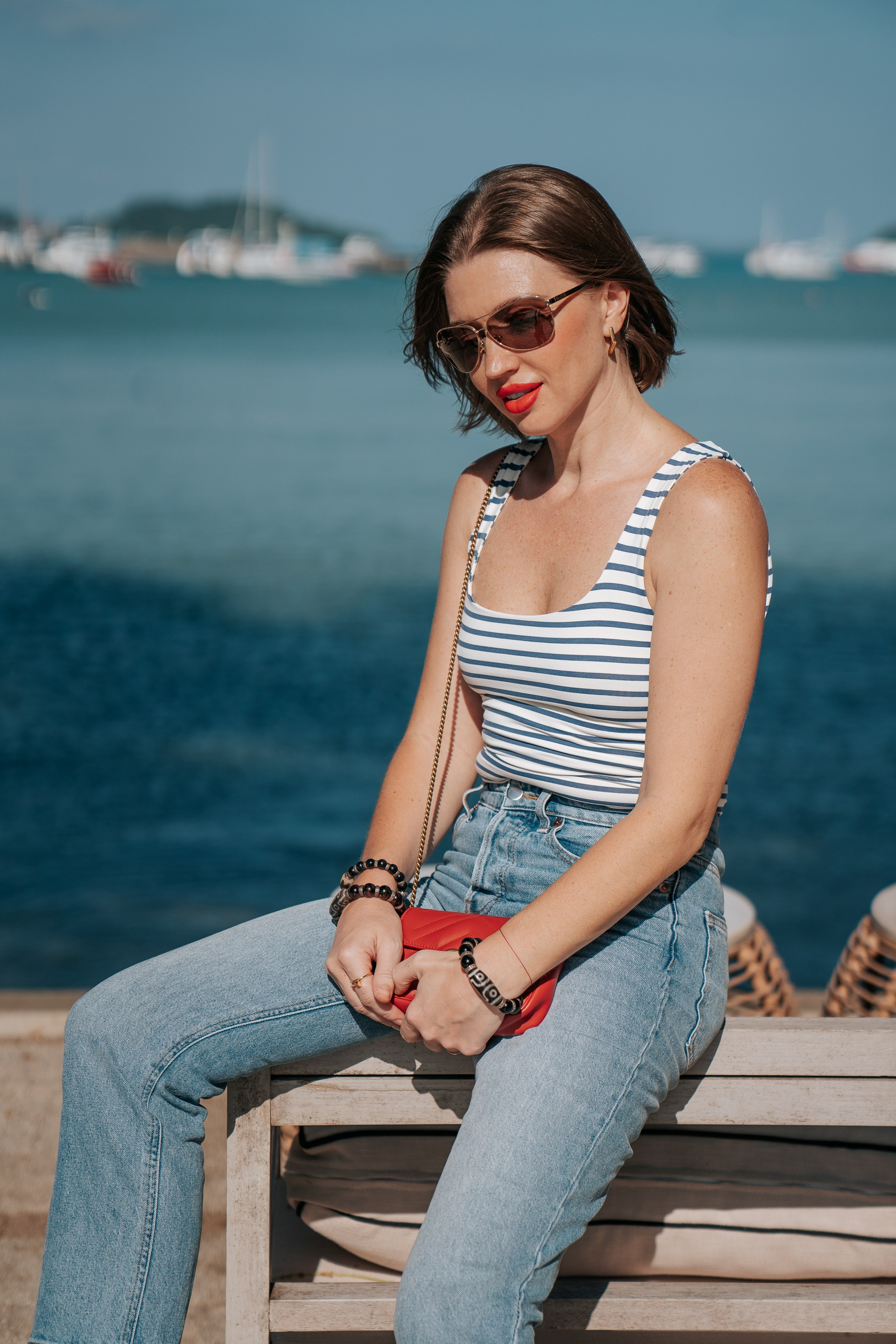 Luxury beach portrait photography in Phuket with sophisticated editorial styling and natural light