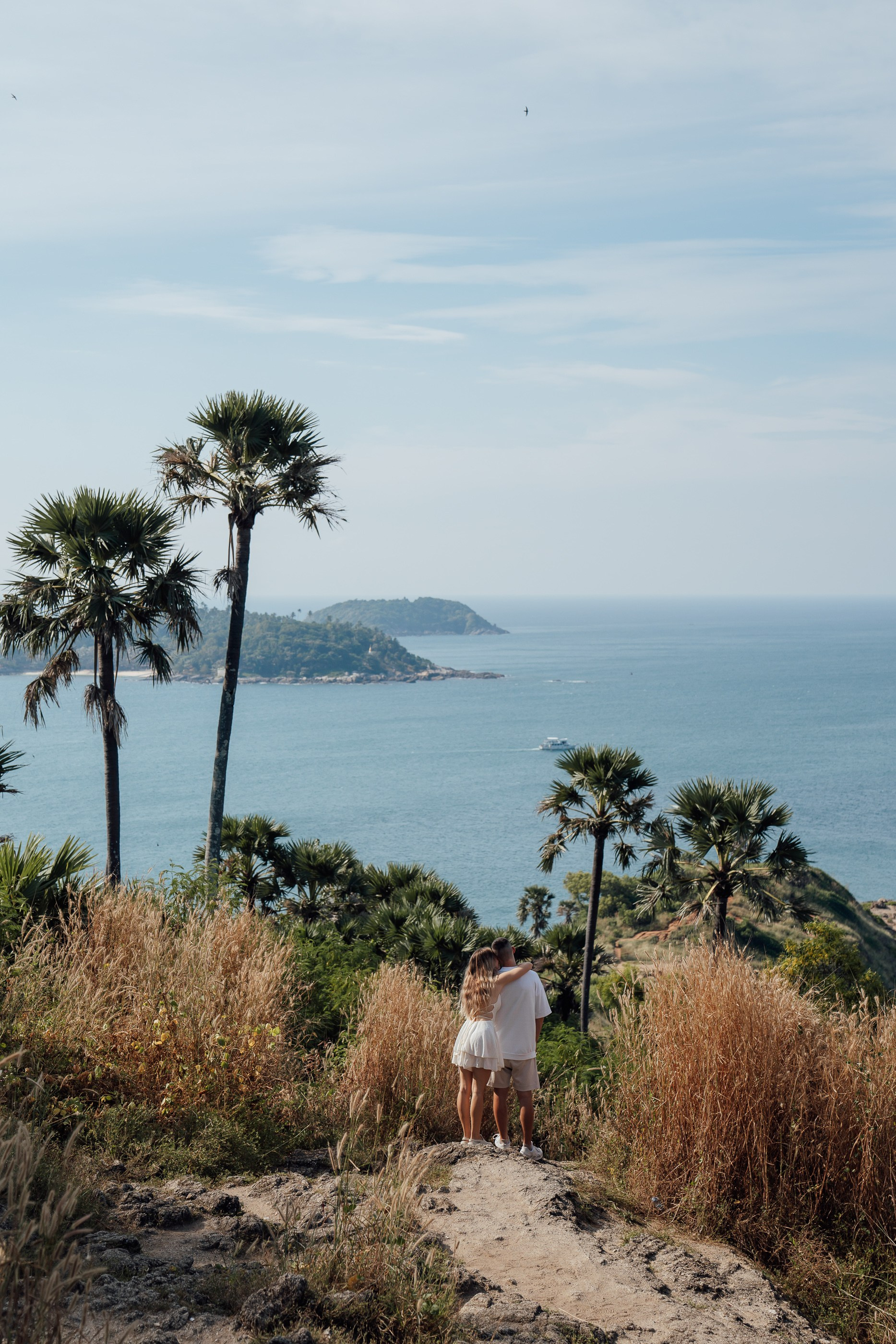 Elegant destination wedding photoshoot in Phuket with a couple on a tropical coastline