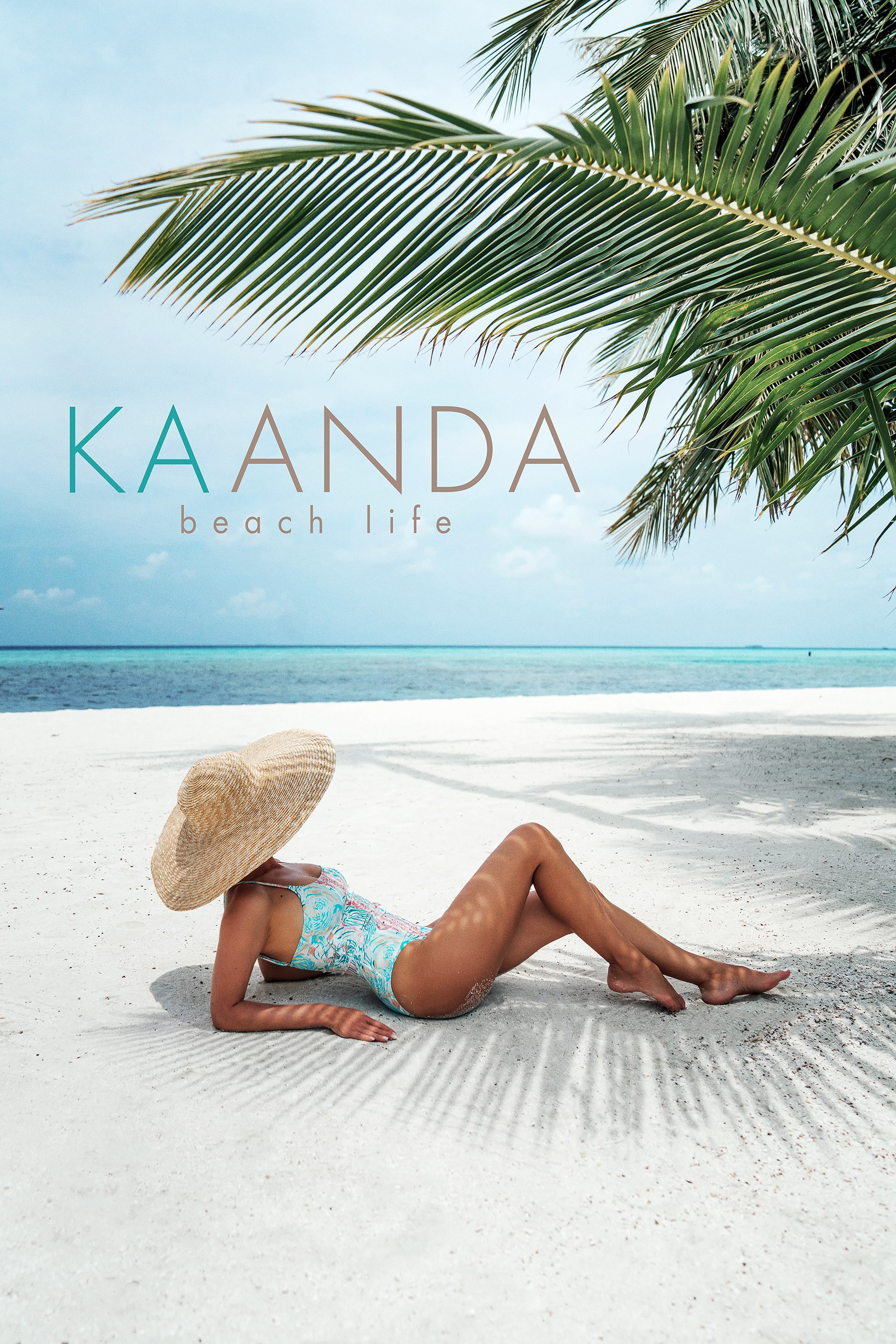 Beachwear brand photography featuring a woman in resortwear by the tropical sea brand Kaanda beachlife Thailand