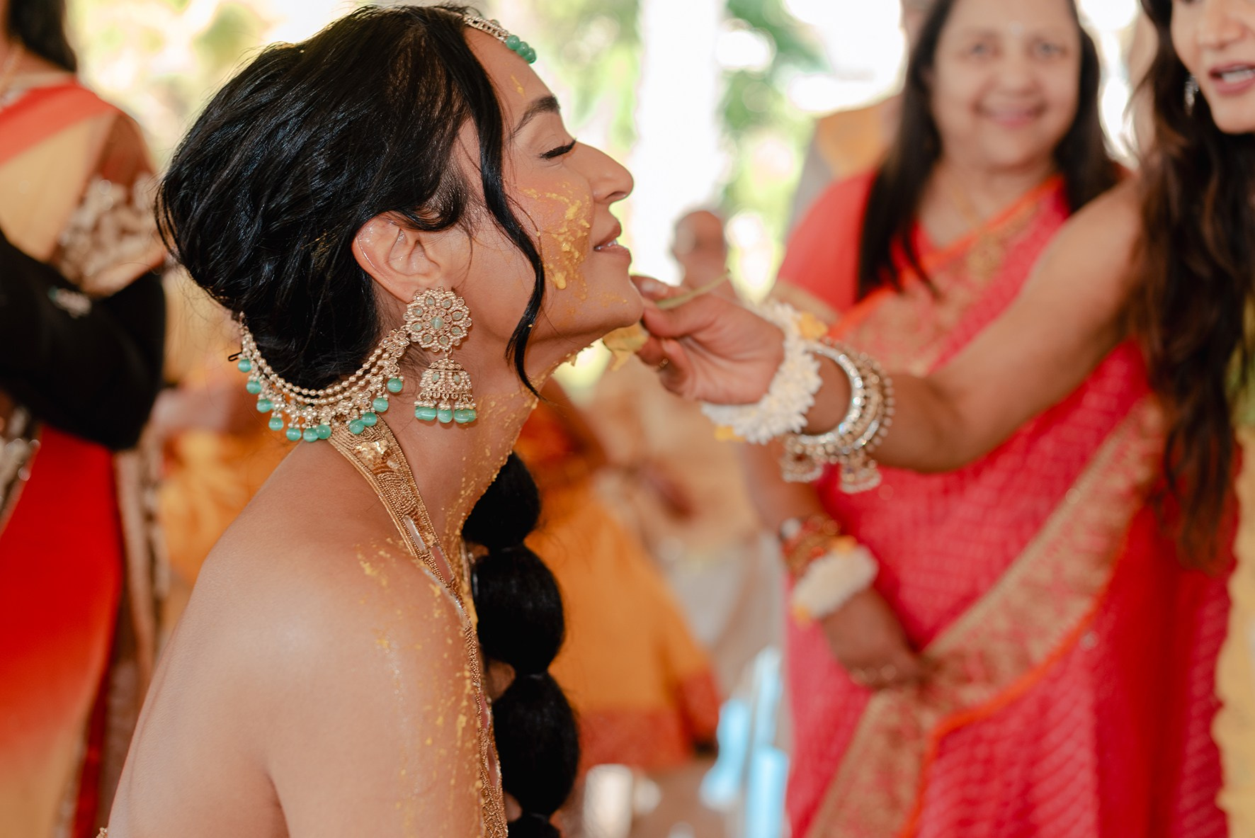 Close-up portrait of Indian bride during Haldi ceremony before her destination wedding in Mexico