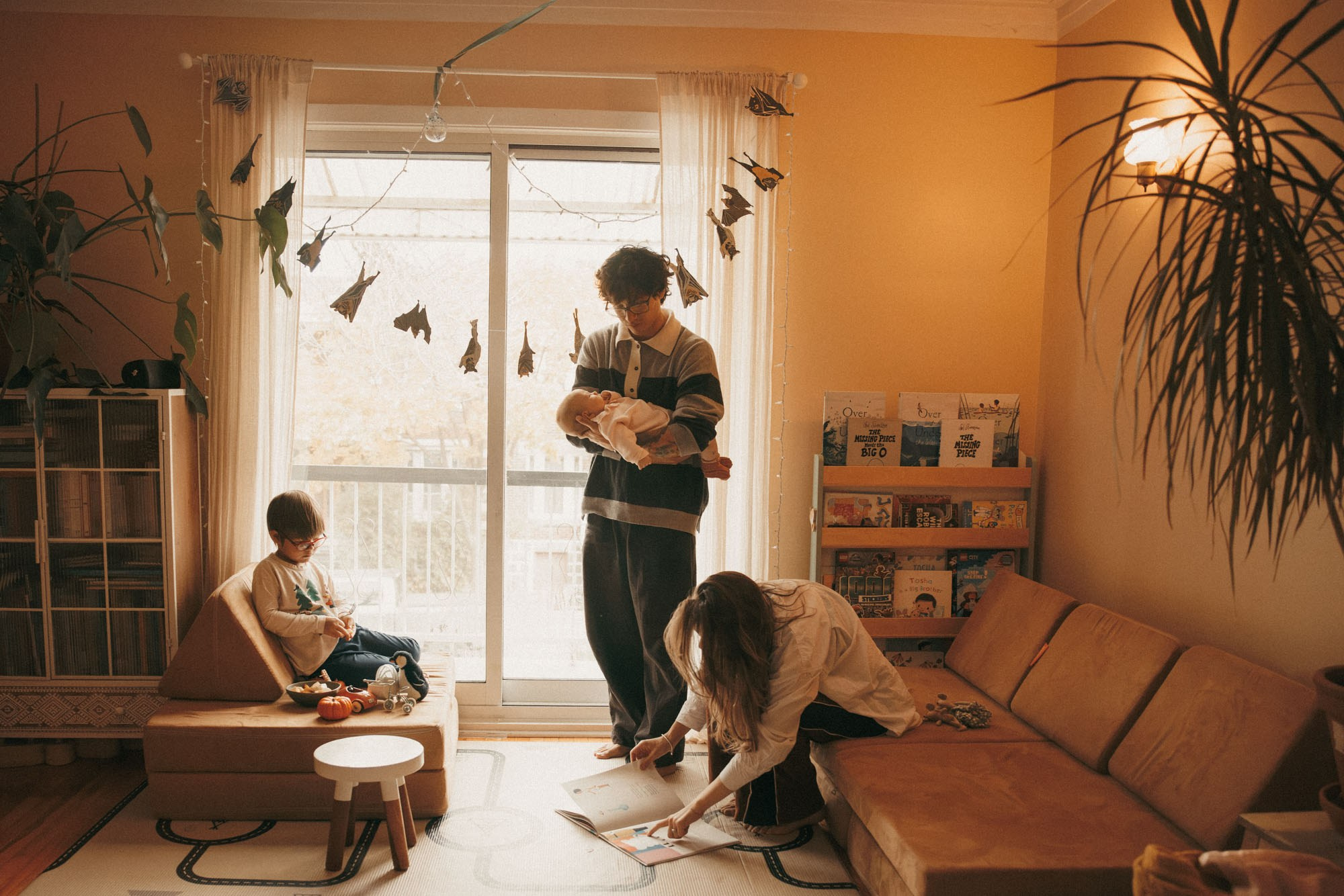 Family of four sharing an ordinary morning at home in Montreal