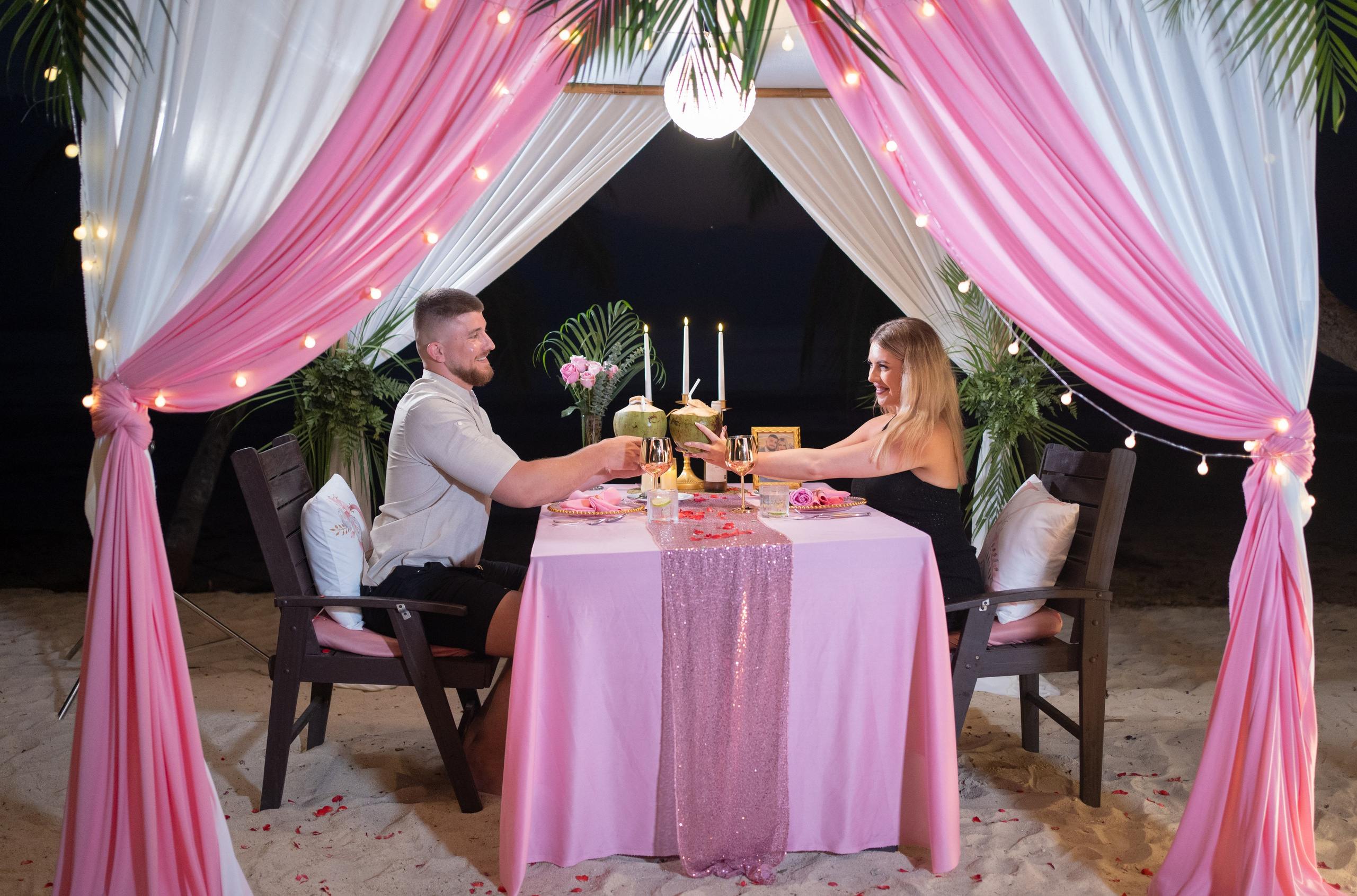 Romantic dinner and proposal setup on Koh Samui beach for couples celebrating engagement.