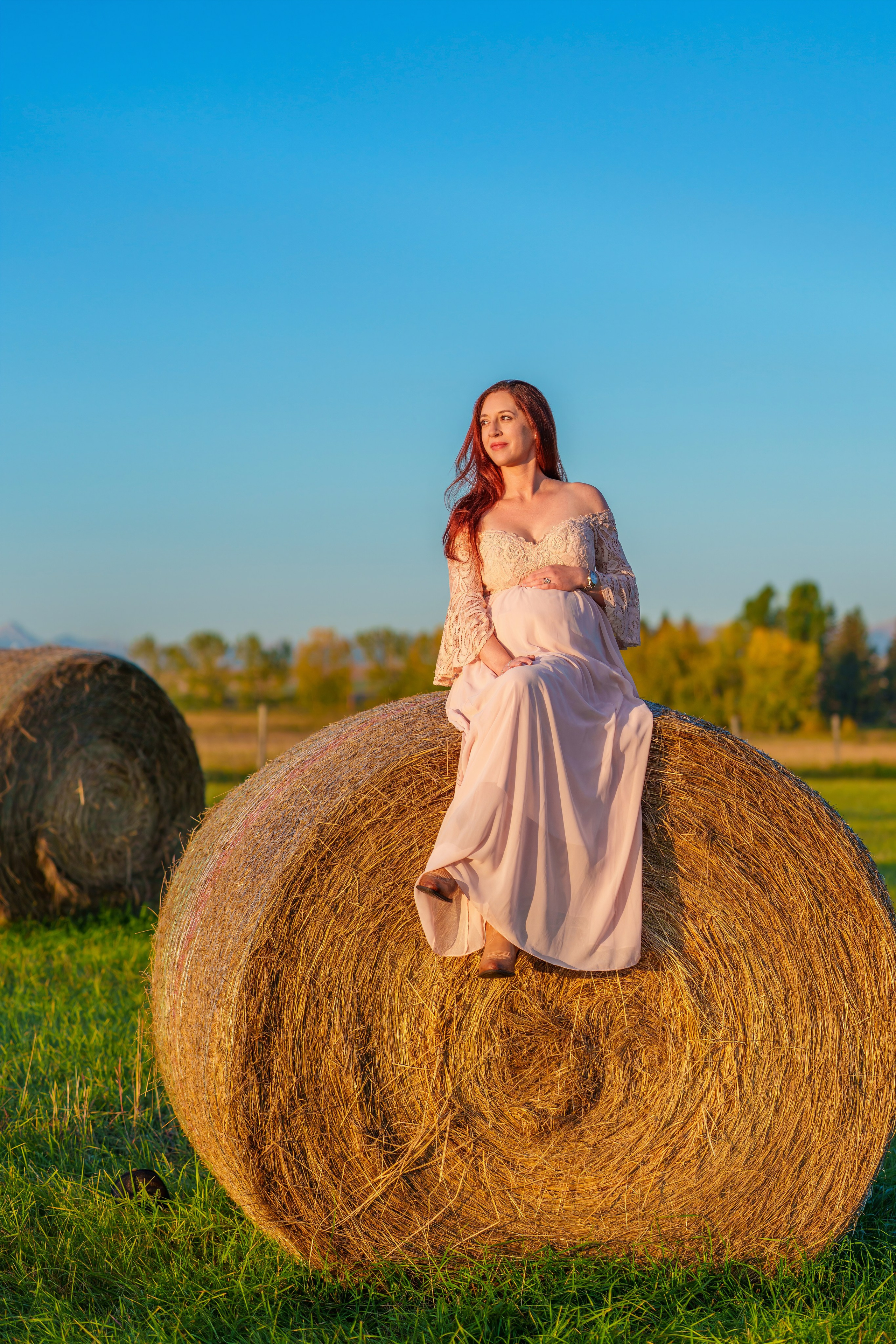 Maternity mini session in Calgary at home with mother-to-be in black