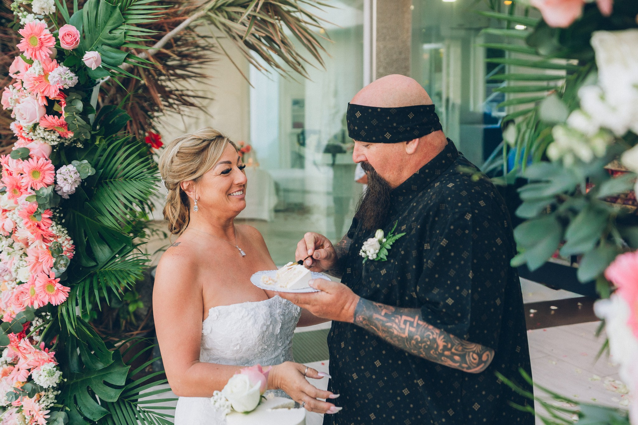 Bride and groom celebrating a sunset wedding at a villa in Koh Samui