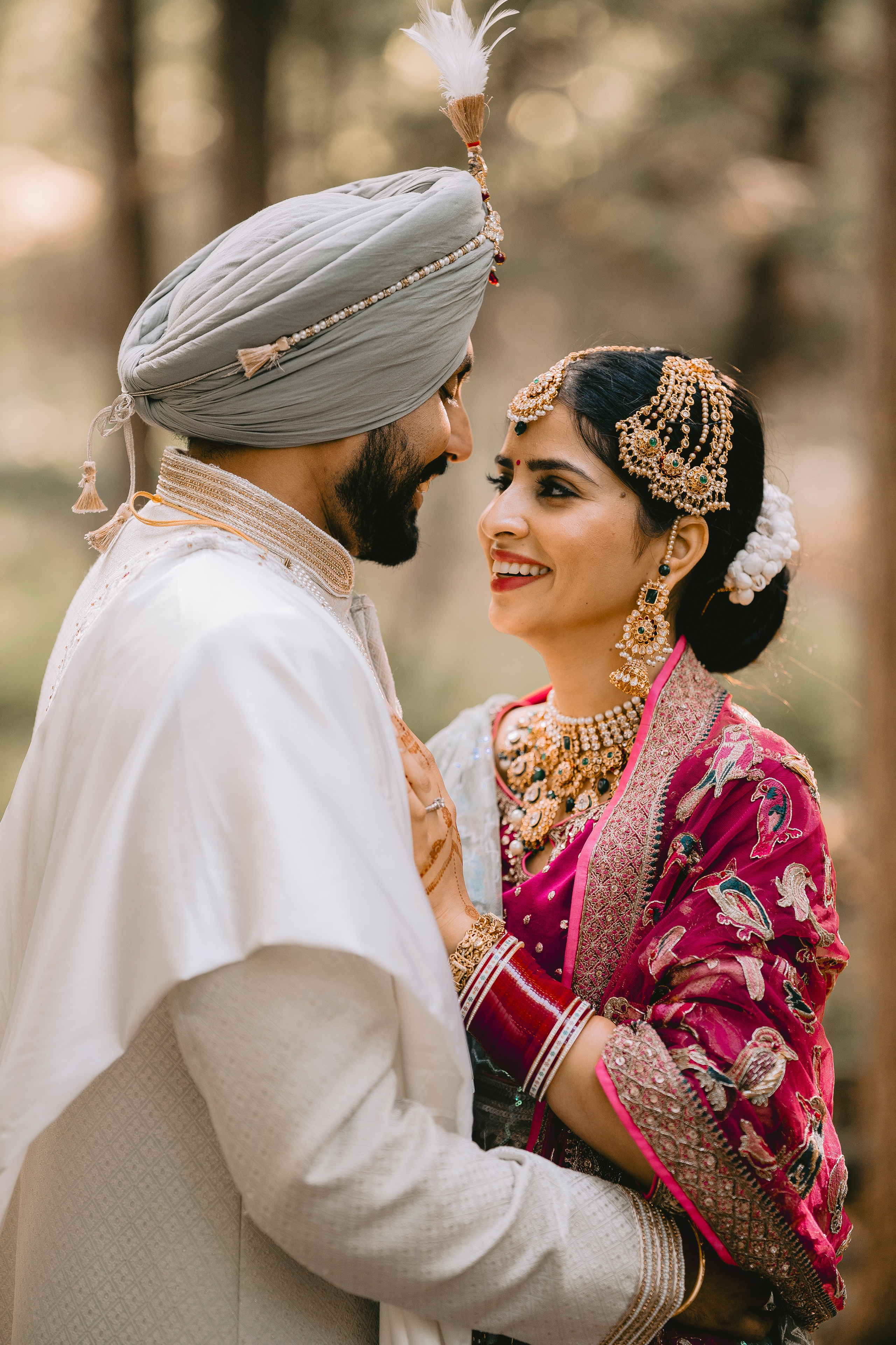 Bride and groom sharing an intimate moment before wedding ceremony