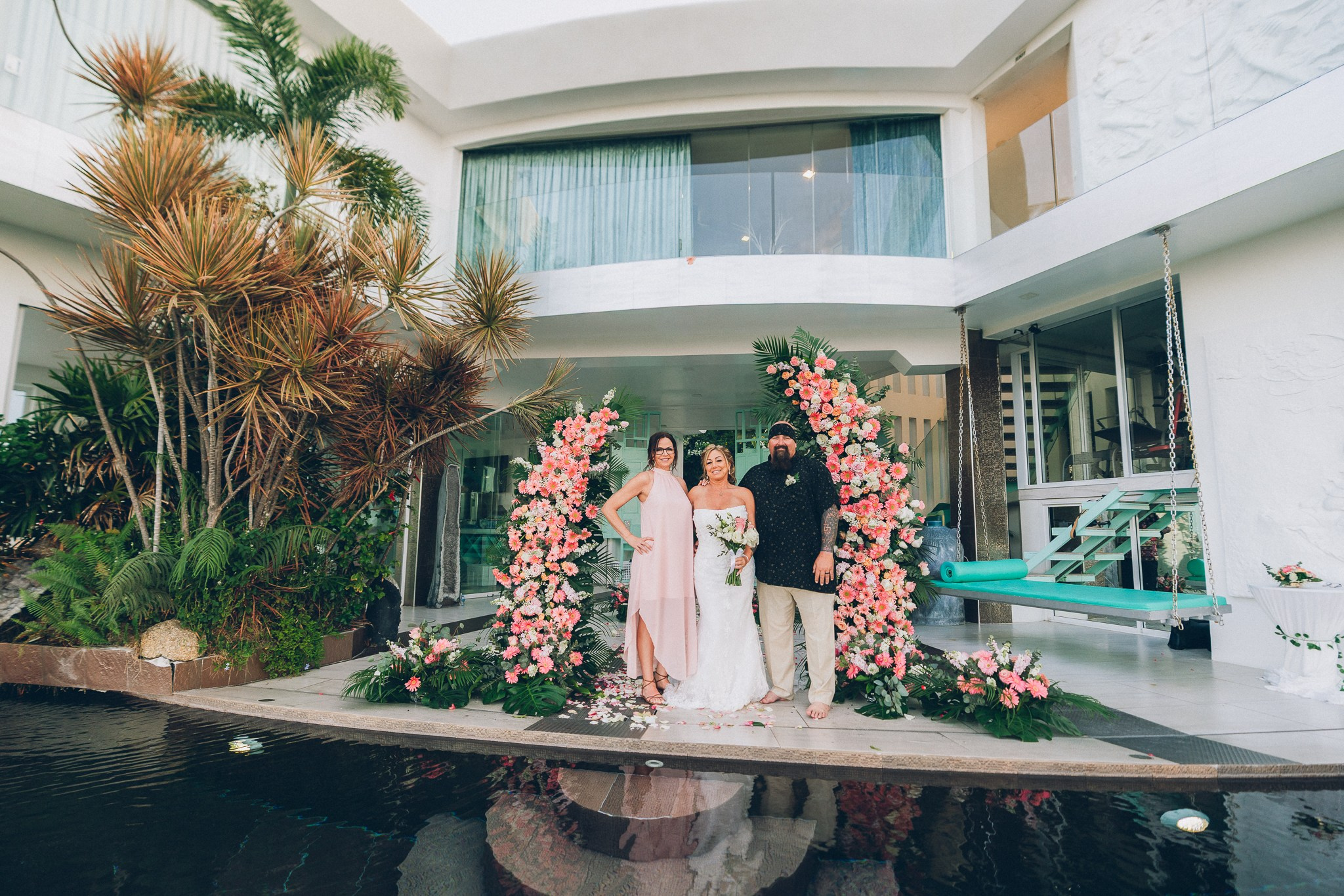 Bride and groom celebrating a sunset wedding at a villa in Koh Samui