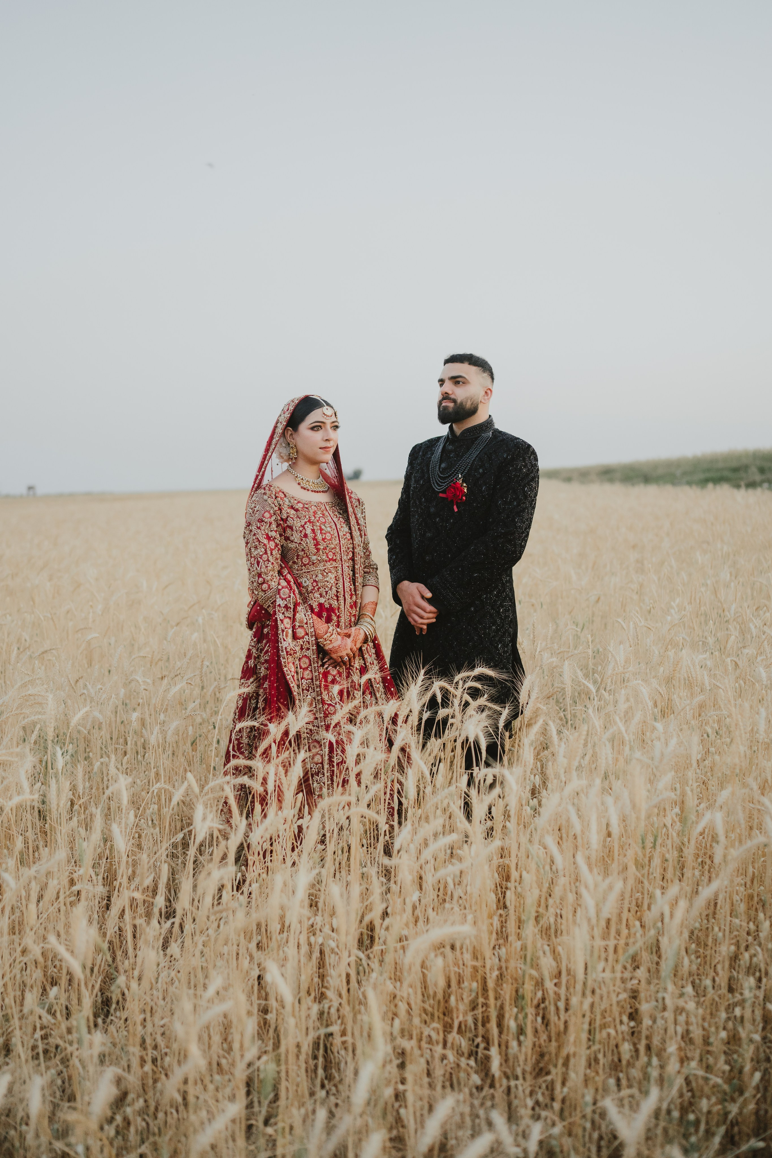 Couple shoot in the fields during sunset 