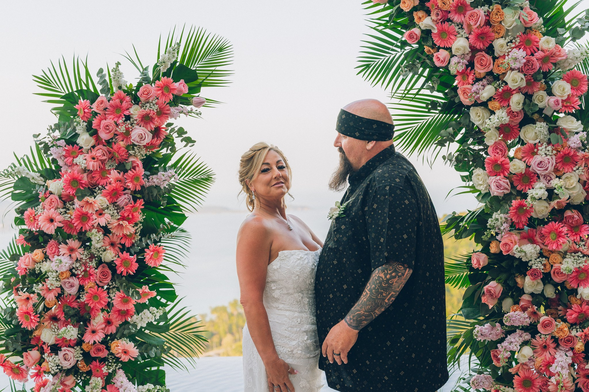 Bride and groom celebrating a sunset wedding at a villa in Koh Samui