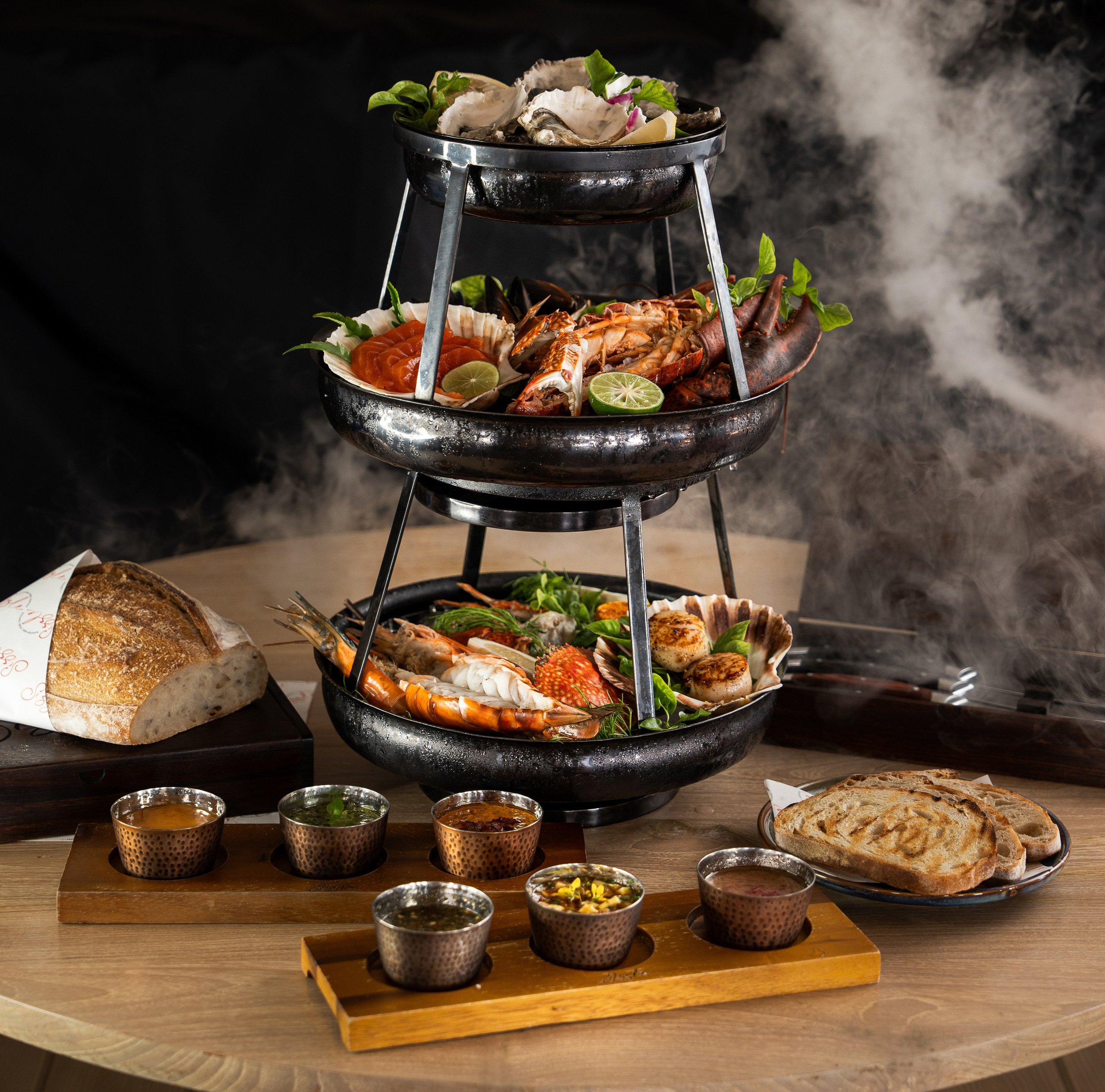 Fresh seafood basket beautifully presented at a tropical resort, showcasing vibrant ingredients and luxury dining photography.