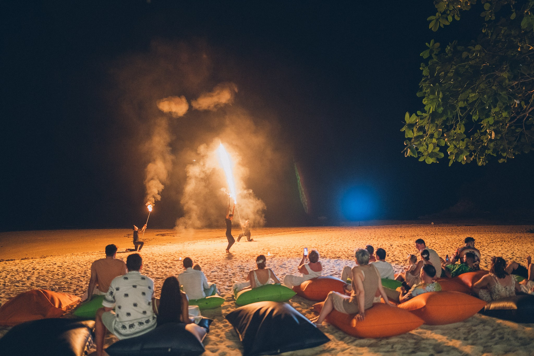 Professional fire dancers performing at a luxury wedding in Thailand