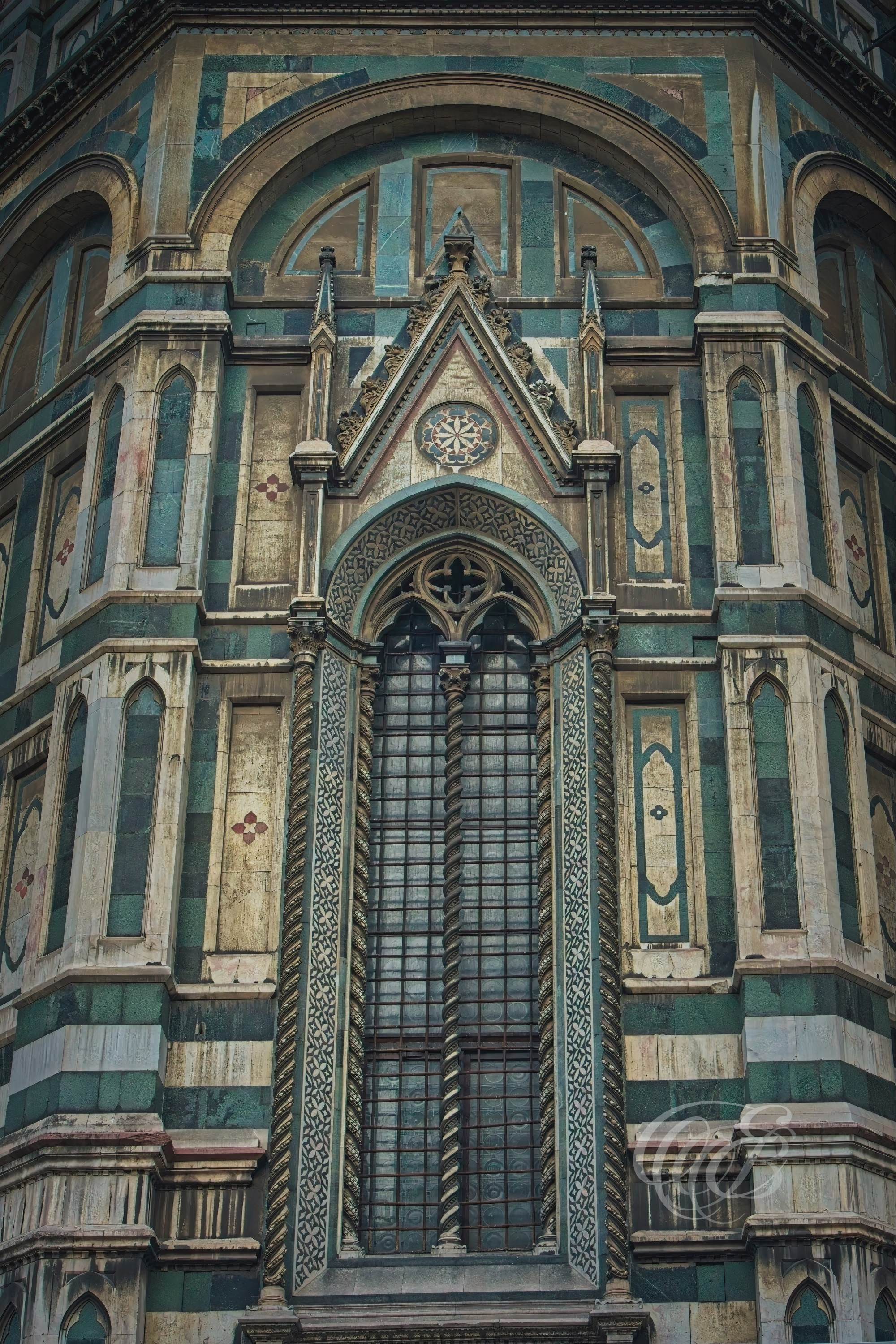 Florence, Italy—Santa Maria del Fiore Window—Eduardo Bartoli Photography—Photograph of a window of Santa Maria del Fiore in Florence, Italy, part of the historic cathedral complex showing Gothic and Renaissance architectural development—Florence, Italy—Santa Maria del Fiore Window—Eduardo Bartoli Photography.