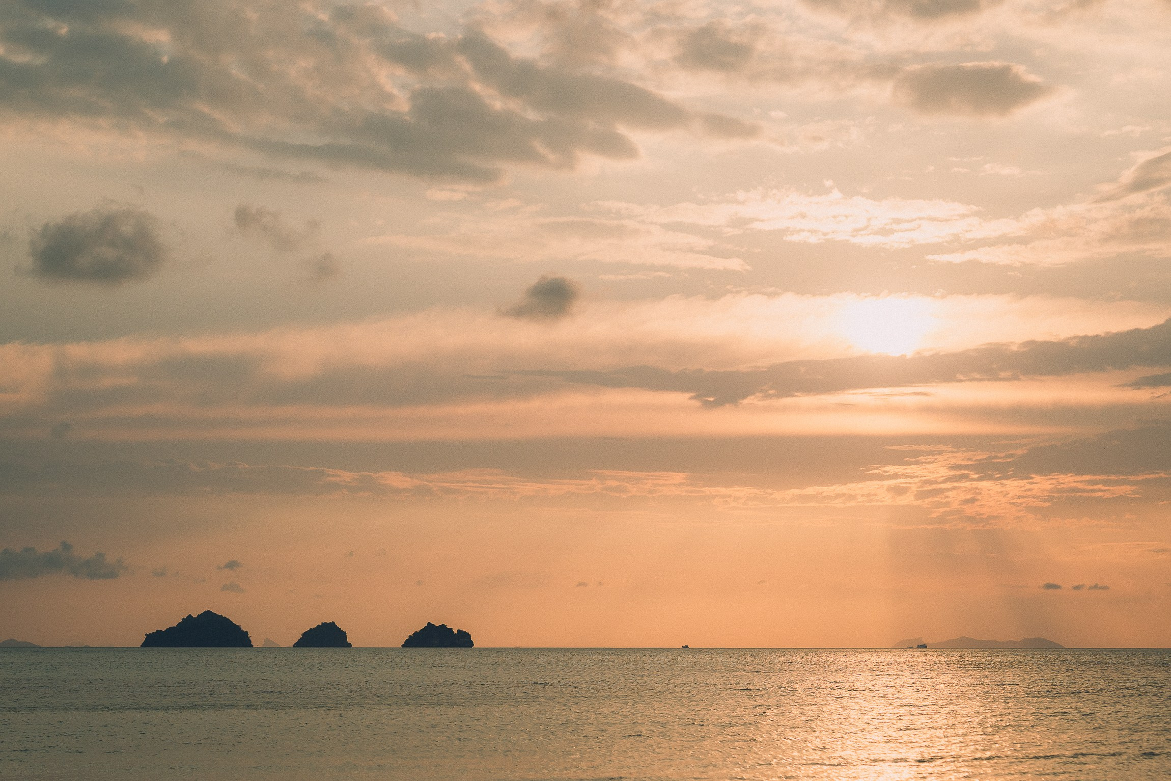 Bride and groom enjoying a just for 2 beach wedding in Koh Samui, Thailand, surrounded by tropical scenery and ocean views