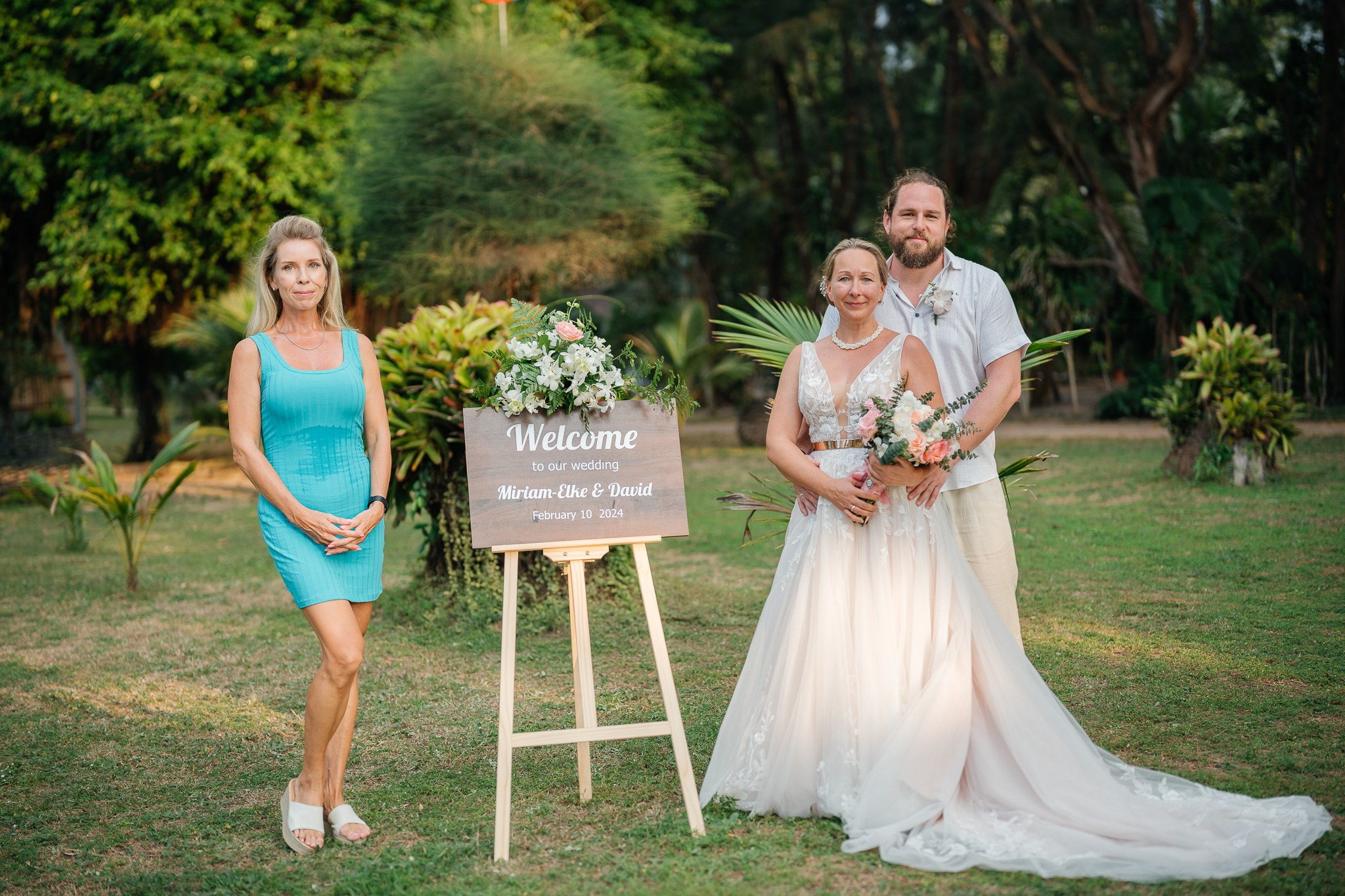 Destination beach wedding in Koh Samui, Thailand with the couple, family members and friends enjoying a tropical wedding ceremony by the sea