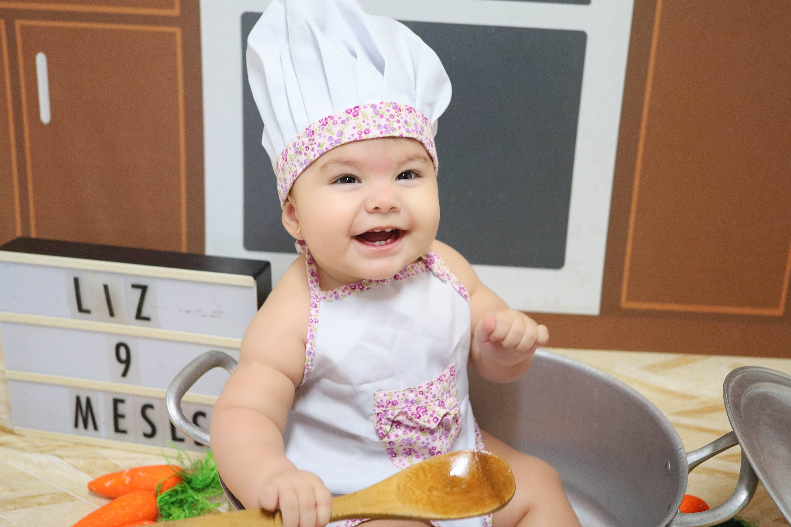Cozinheira (6M-12M). Estúdio Gustavo Bueno