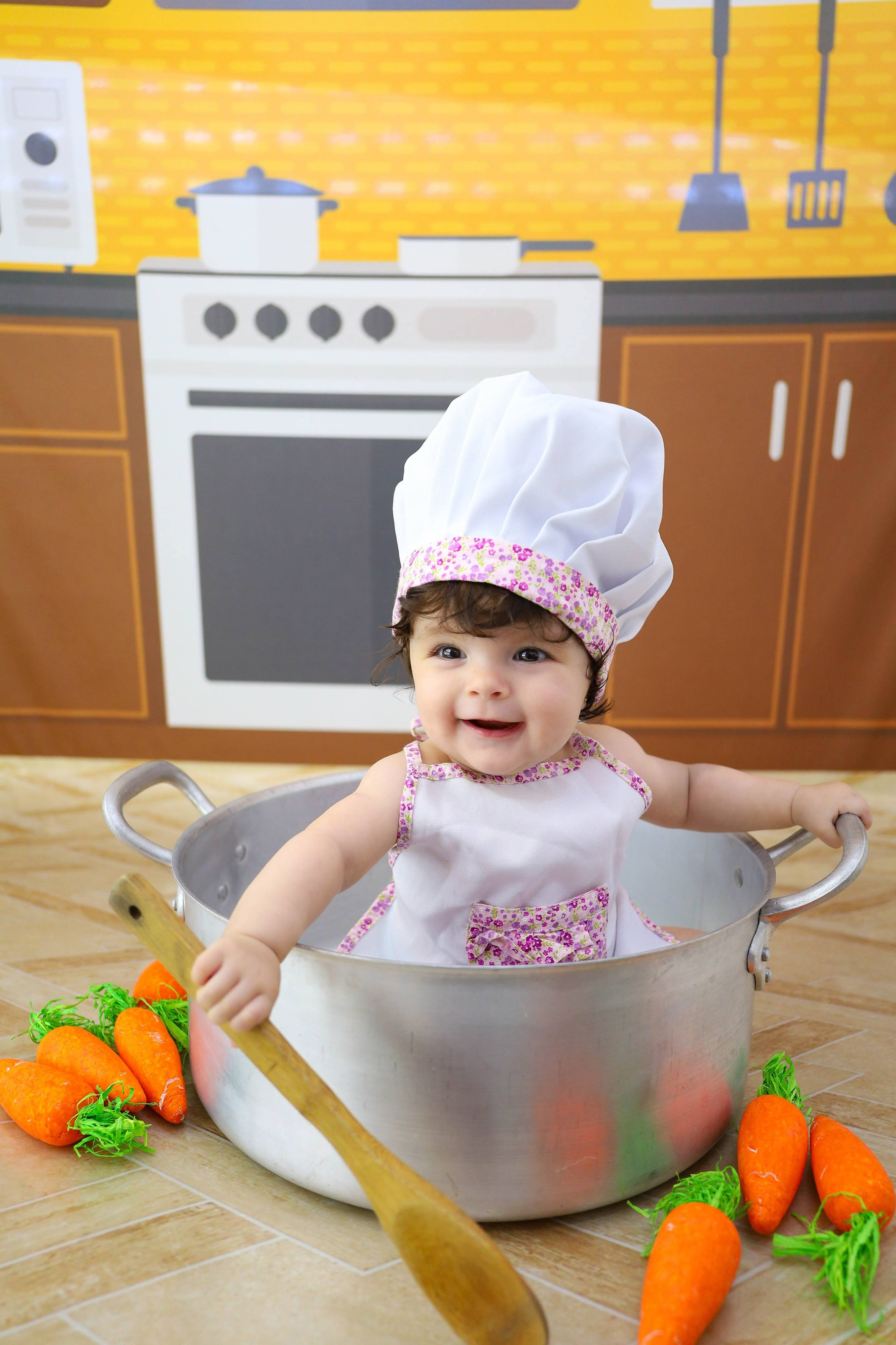 Cozinheira (6M-12M). Estúdio Gustavo Bueno