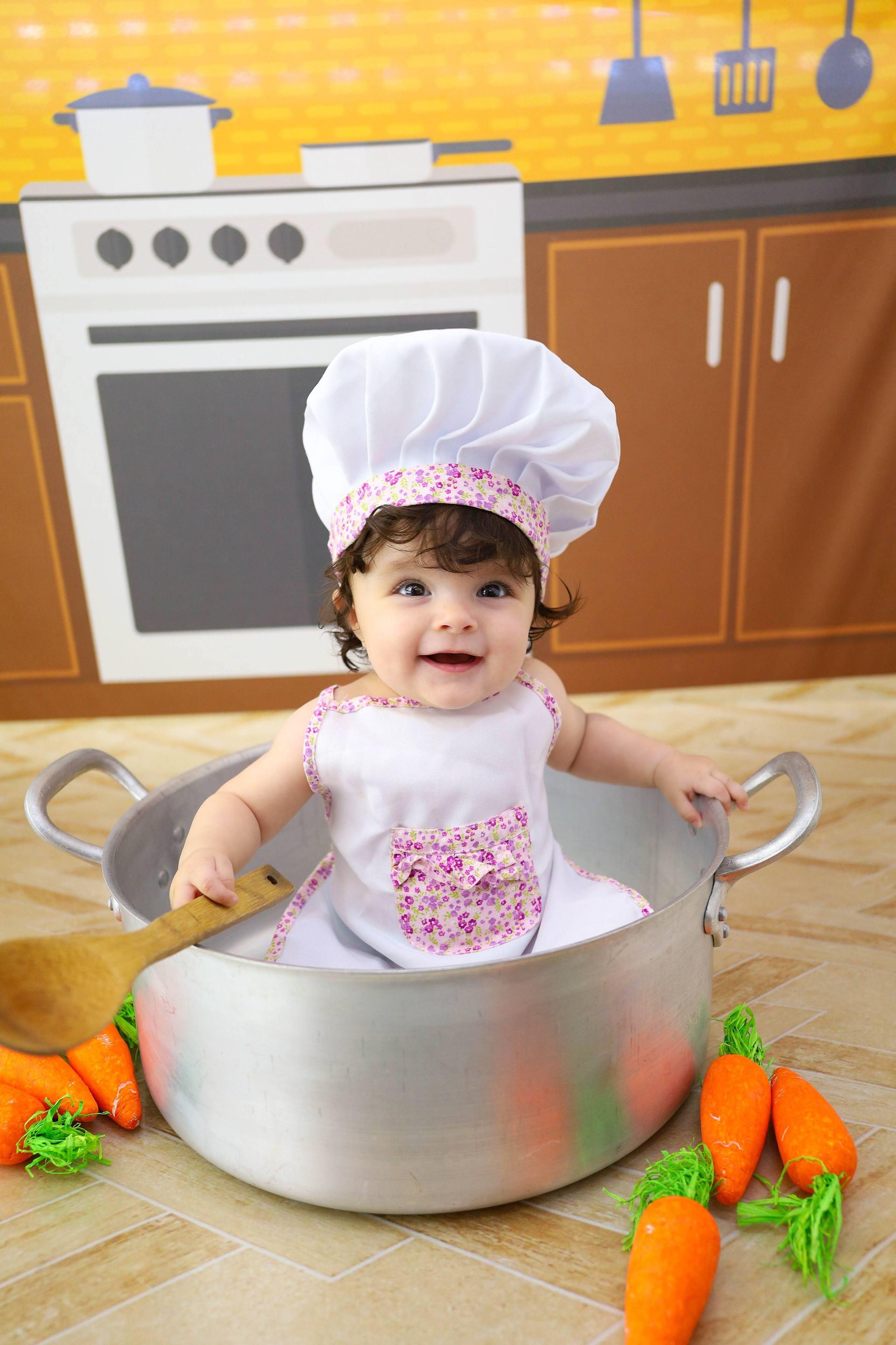 Cozinheira (6M-12M). Estúdio Gustavo Bueno