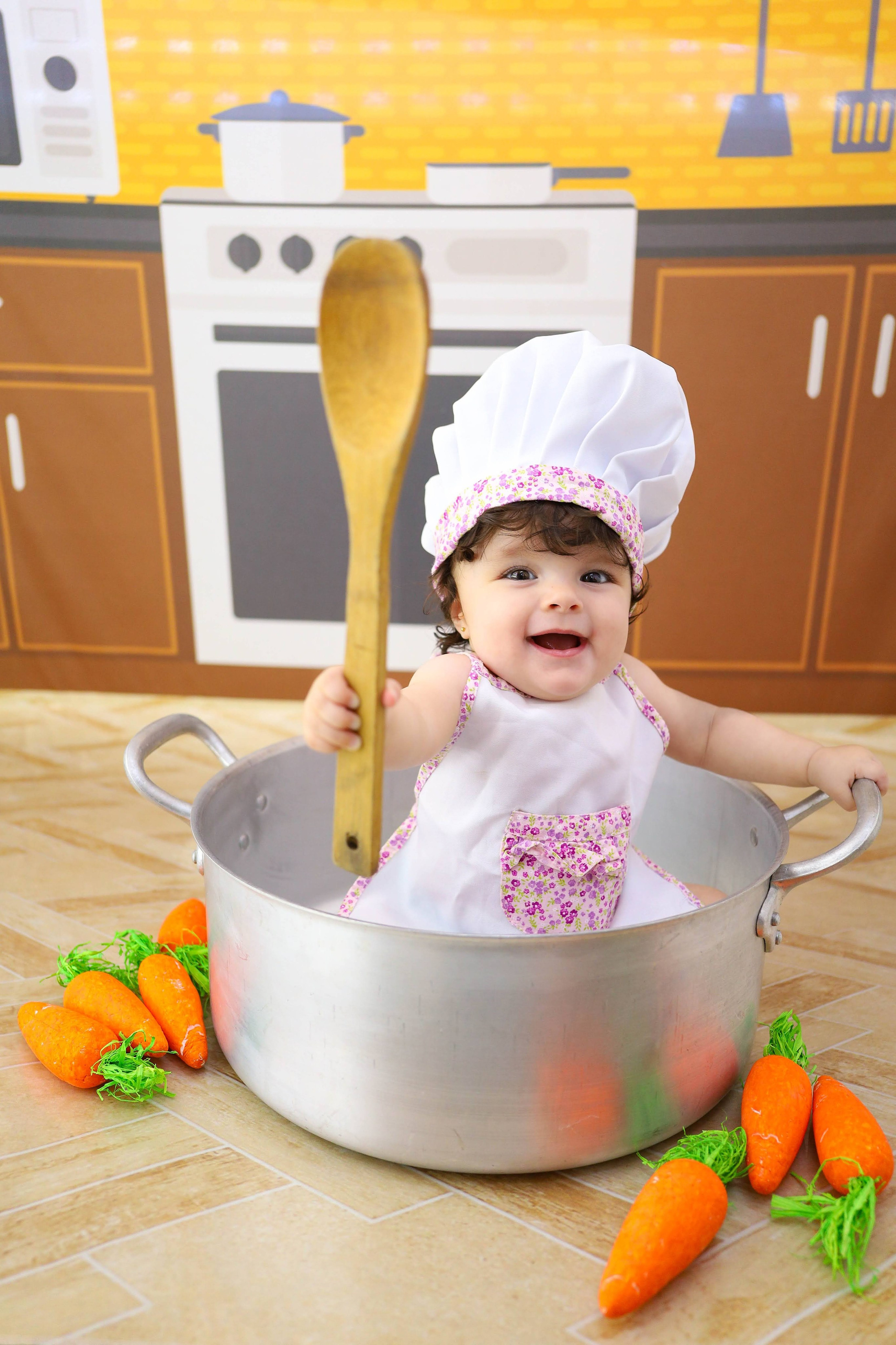 Cozinheira (6M-12M). Estúdio Gustavo Bueno