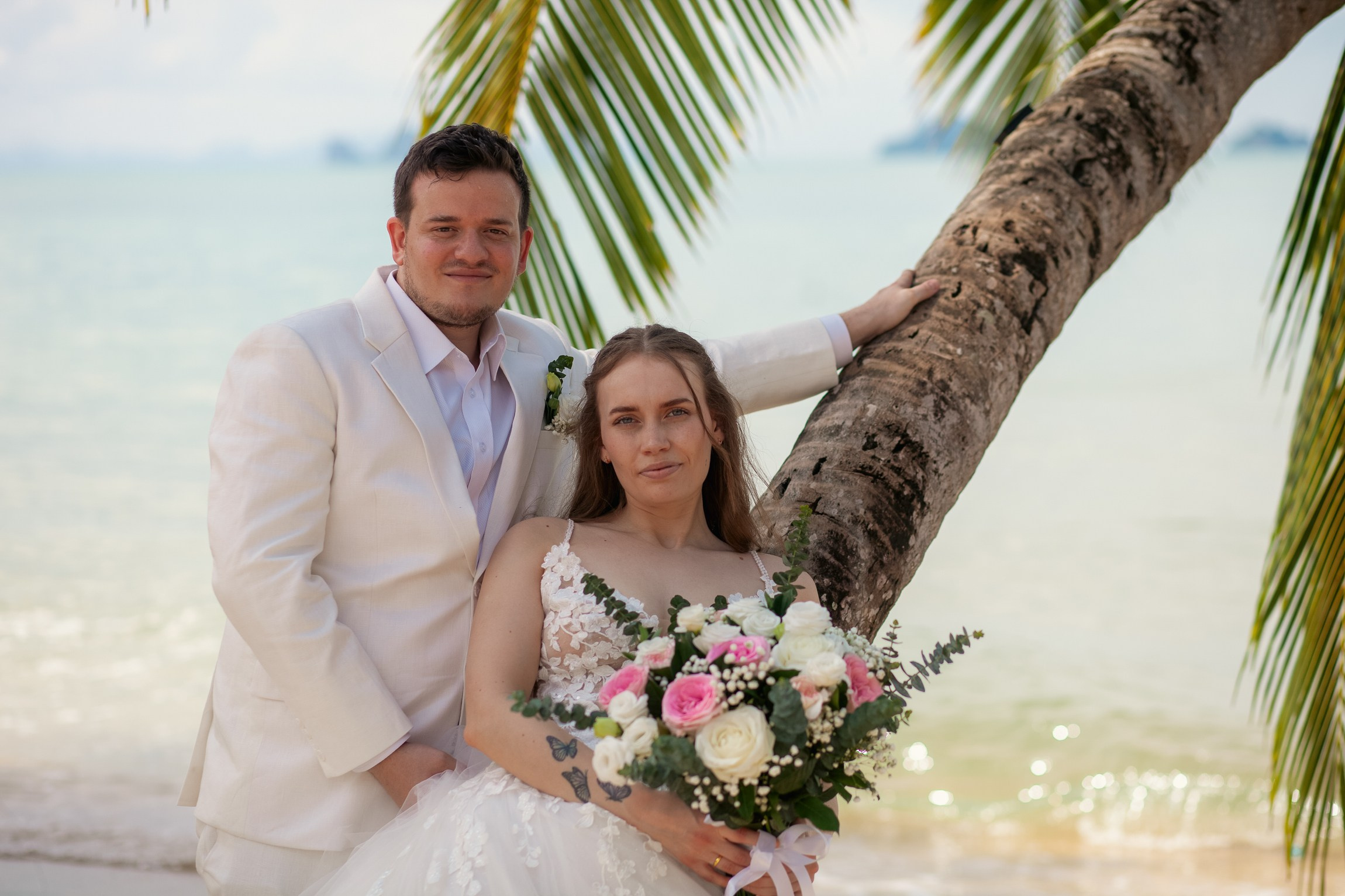Elegant escape wedding for two on a beautiful beach in Koh Samui, Thailand with romantic wedding decorations