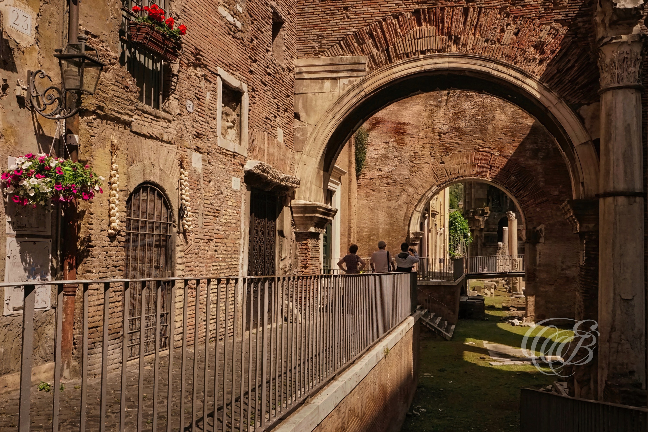 ITALY TRAVEL PHOTOGRAPHY – ITALY – ROME — Ancient Stone Wall of the Porticus Octaviae in the Jewish Ghetto — Remains of the ancient Roman Porticus Octaviae integrated into the historic Jewish Ghetto area, showing imperial-era stone architecture, Rome, Italy — Eduardo Bartoli Photography.