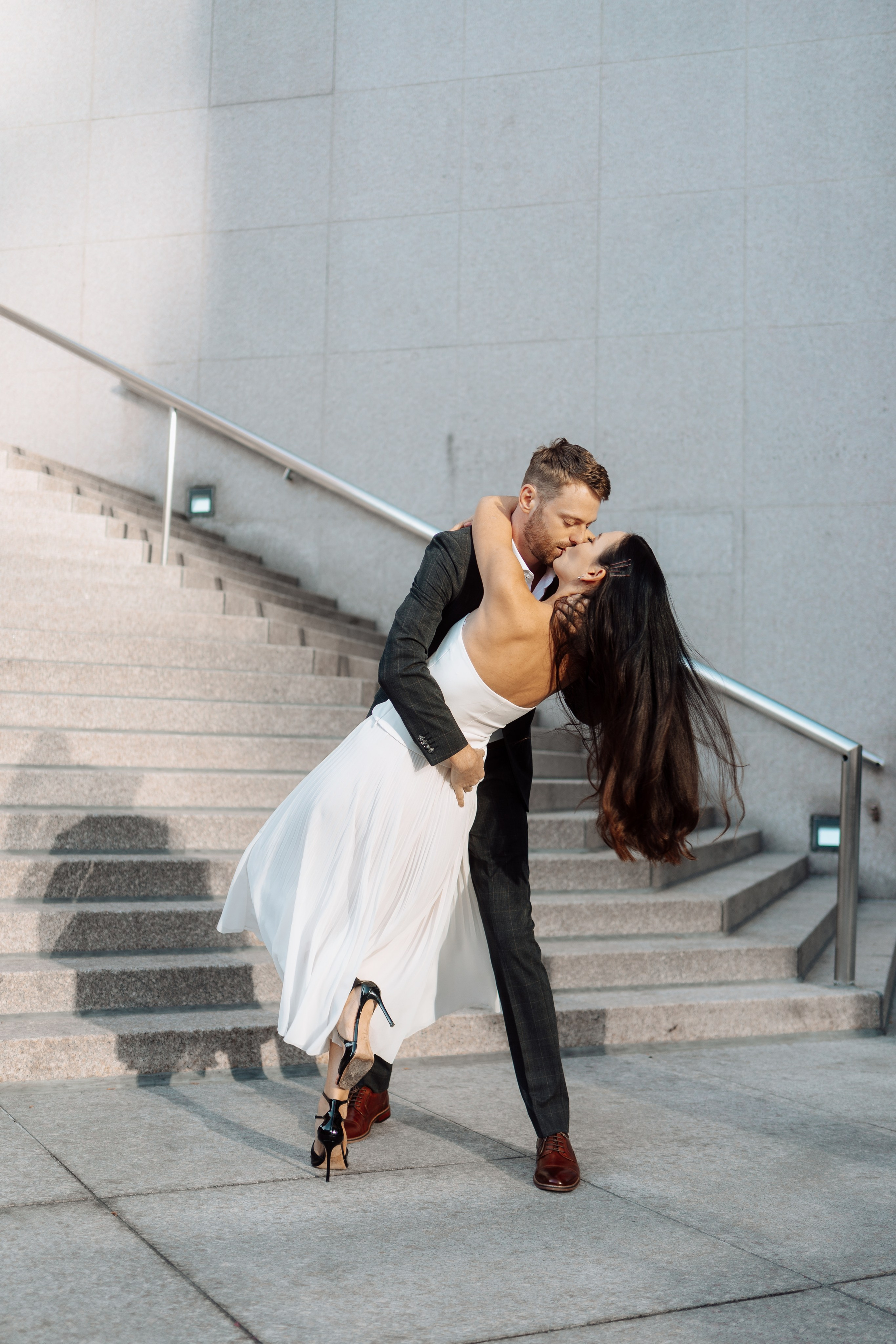 Elegant wedding photos of the bride and groom in Windsor and Toronto.