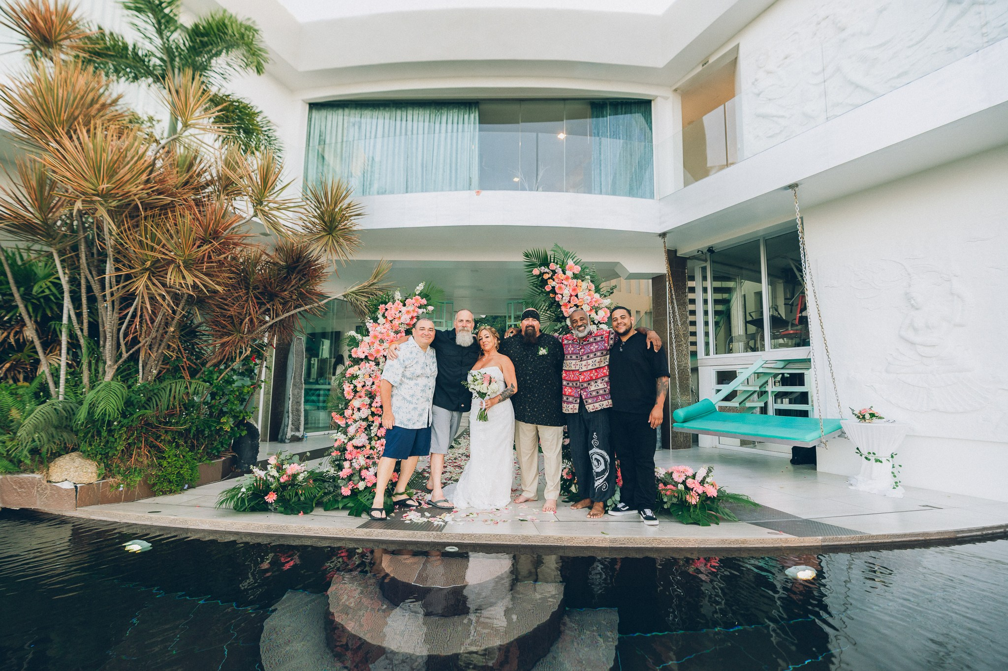 Bride and groom celebrating a sunset wedding at a villa in Koh Samui