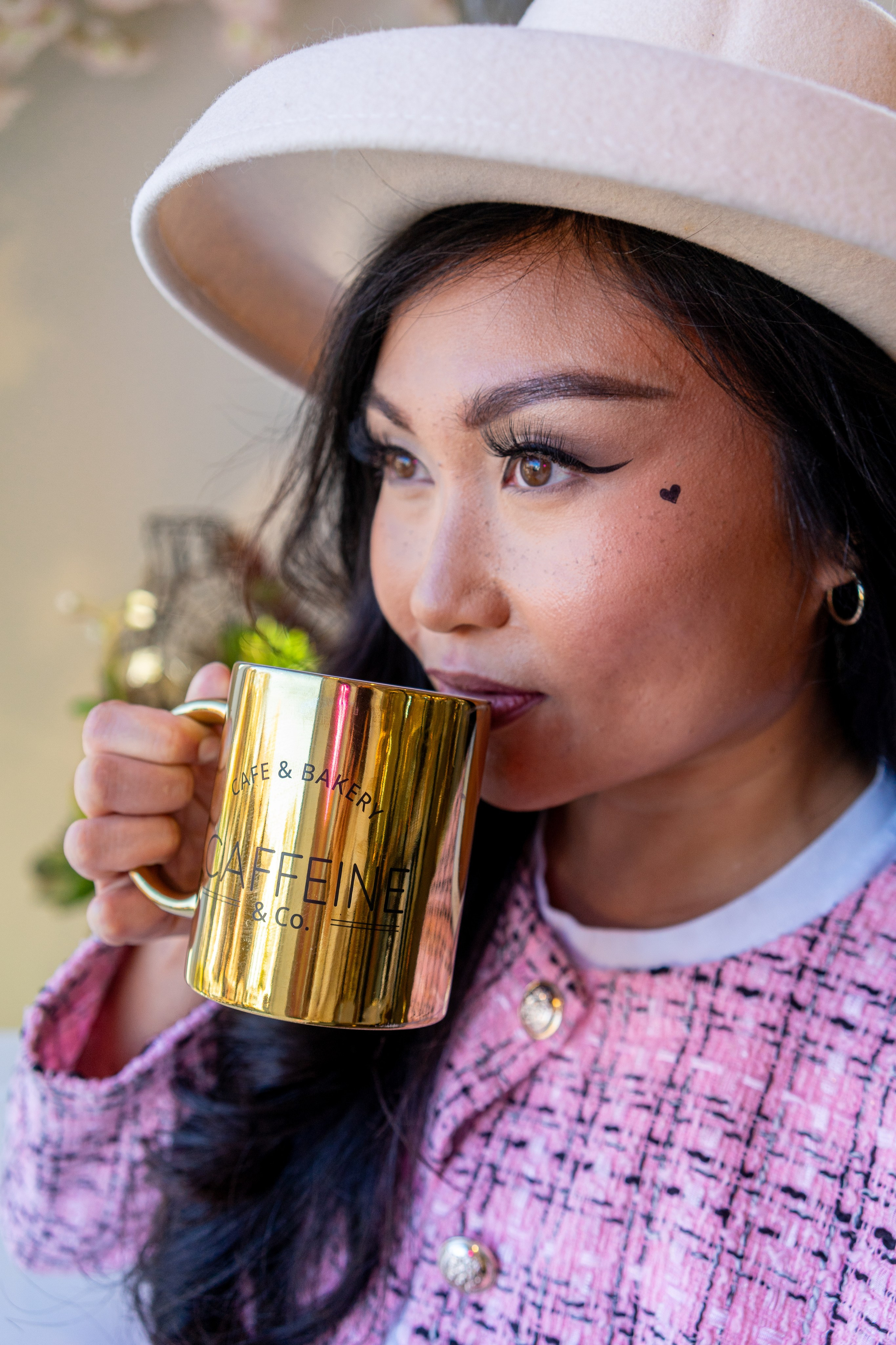 Portrait photography in Windsor, Ontario, with a photoshoot in a café that highlights your individuality and creativity.