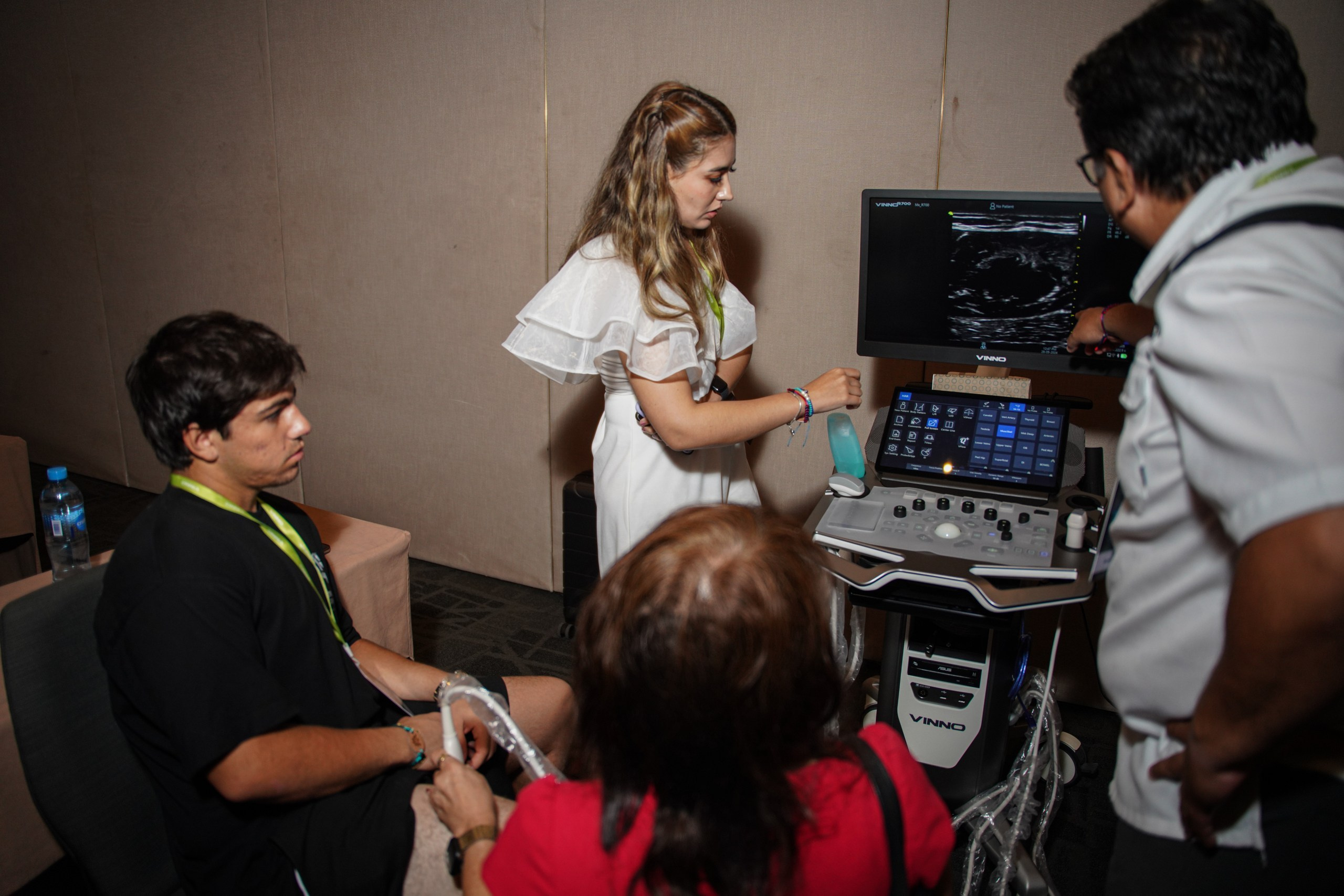 Technician presenting step-by-step usage of new medical tool.