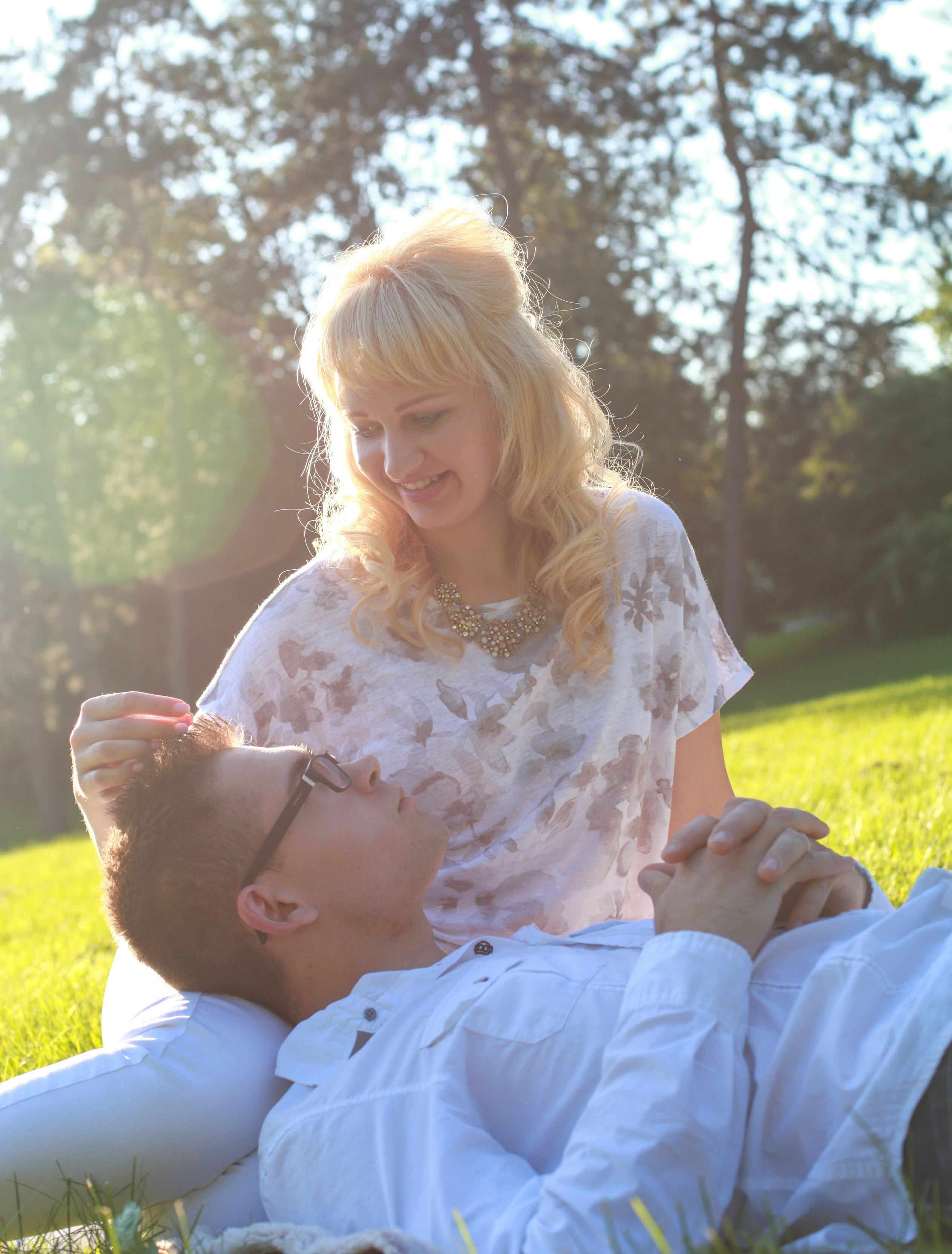 Romantic couples portrait in golden hour back-light, Central Experimental Farm Ottawa.