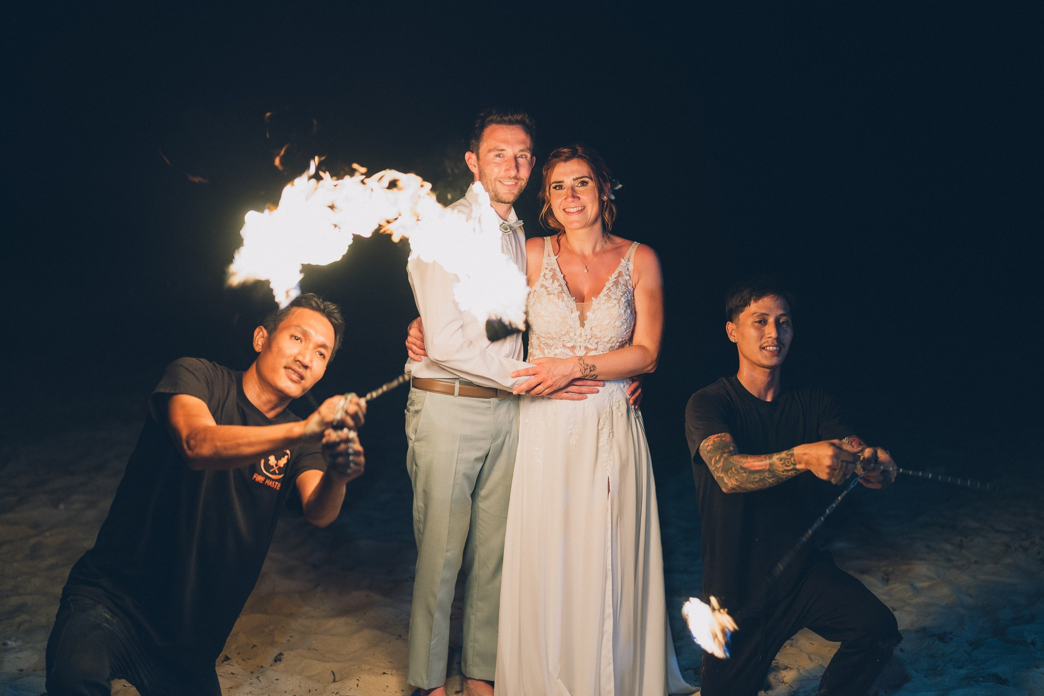 Professional fire dancers performing at a luxury wedding in Thailand