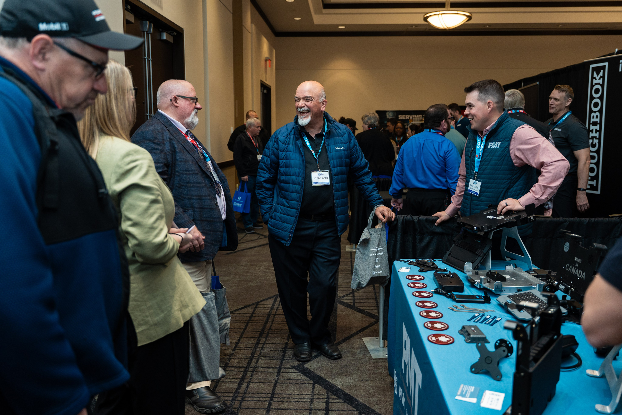 Attendees browsing exhibitor booths, Blueline Expo 2026