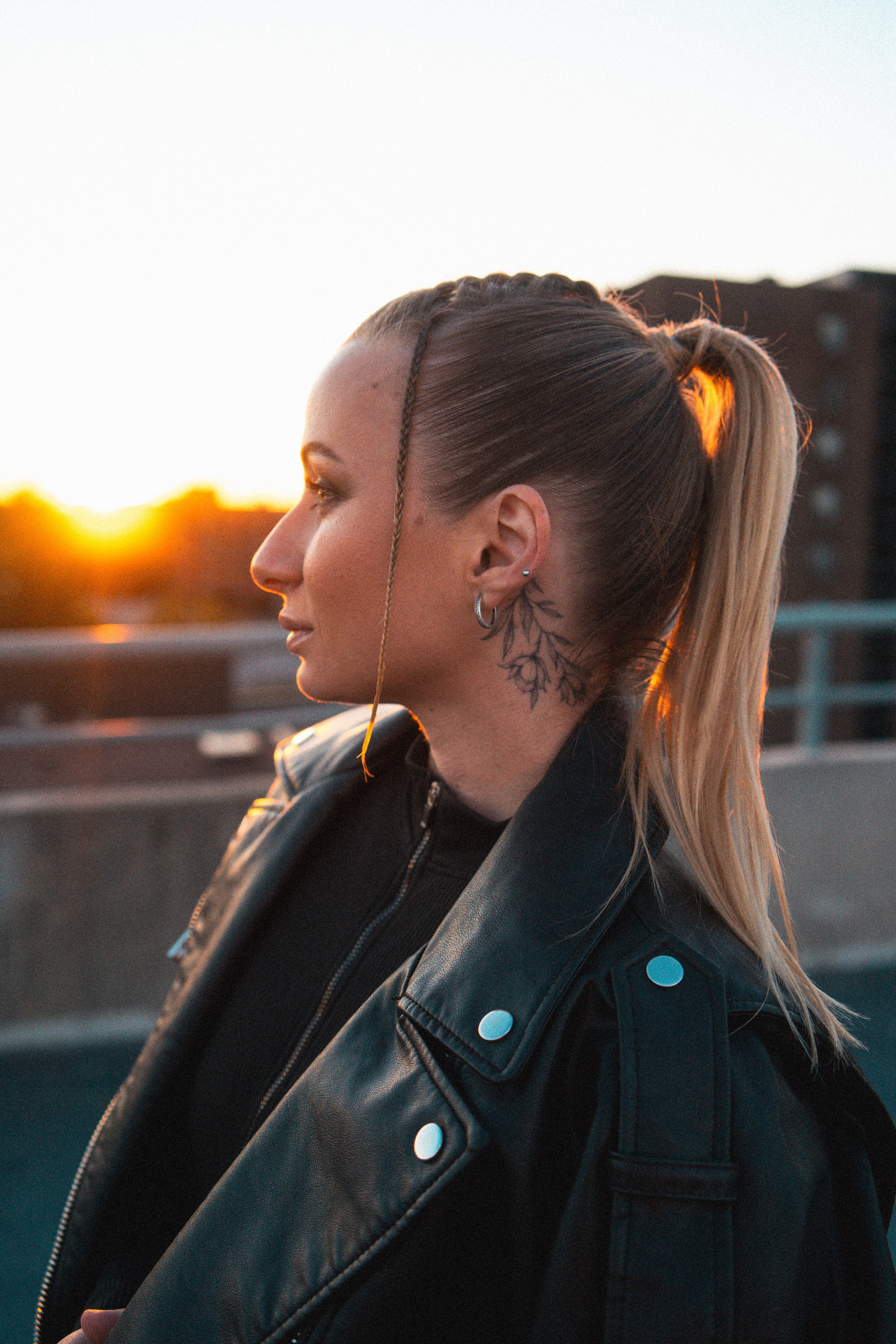 A stunning rooftop portrait session in Windsor, Ontario, showcasing your personal style with a creative touch.