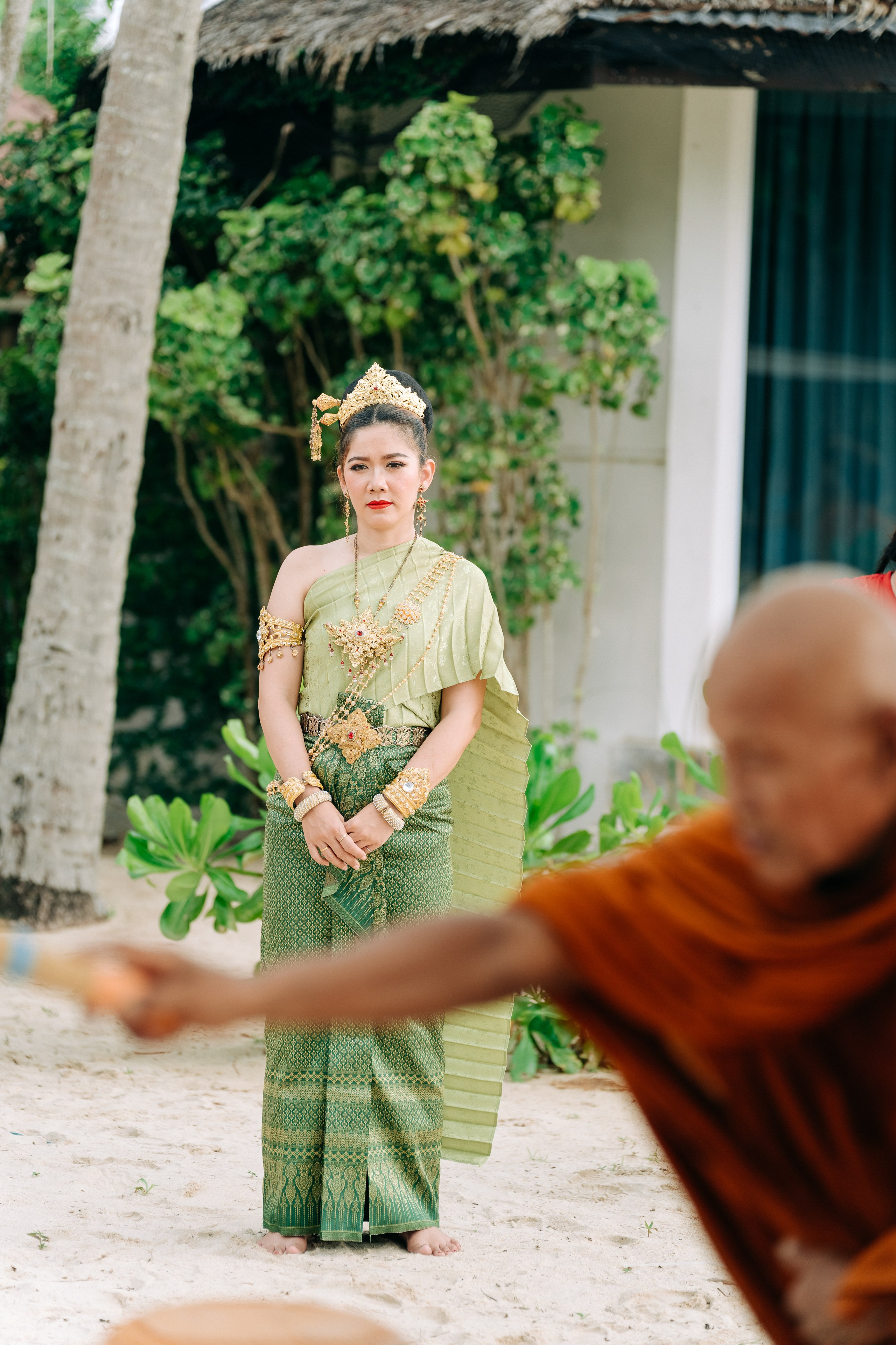Couple celebrating a spiritual Buddhist wedding ceremony on Koh Samui