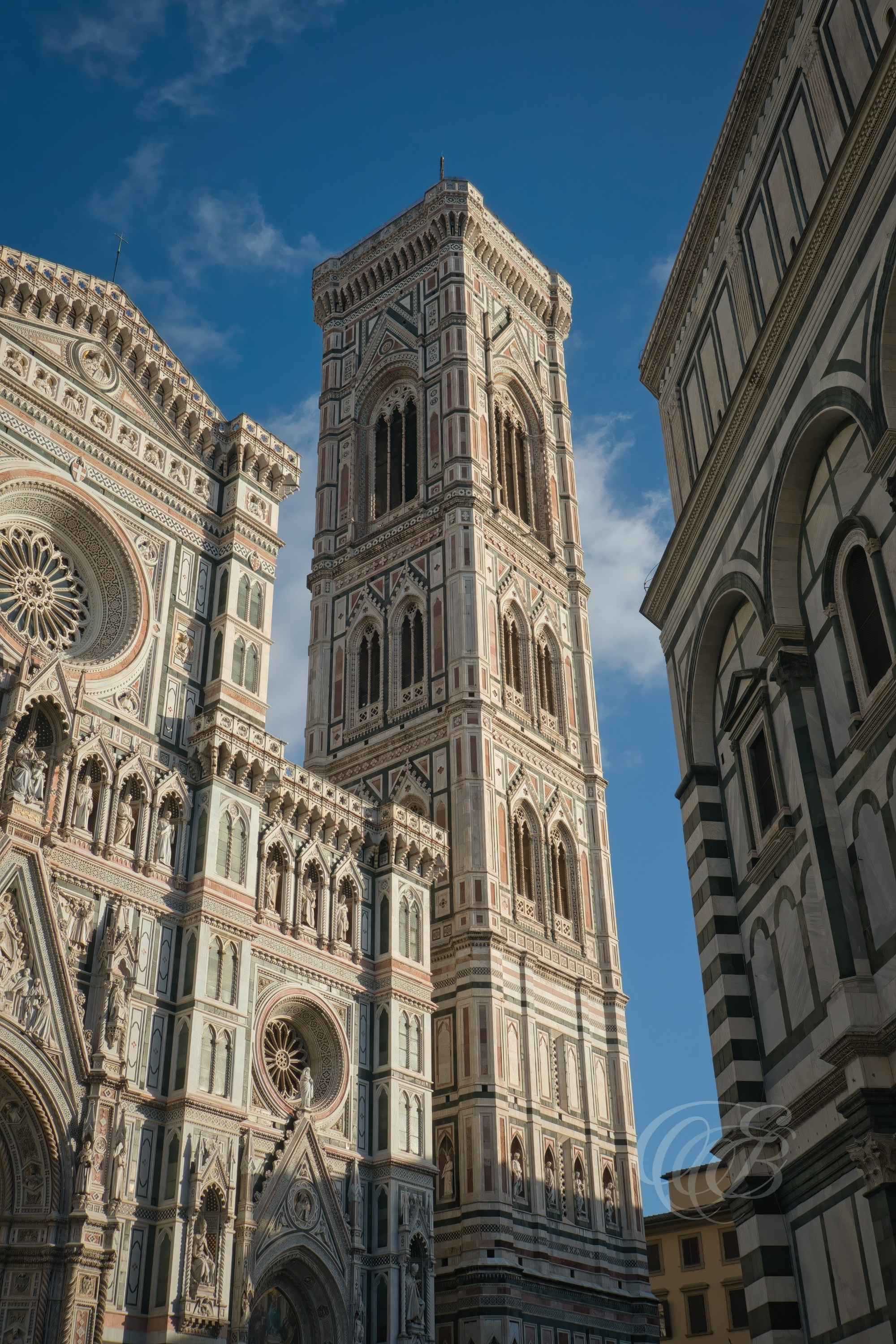 Florence, Italy—Santa Maria del Fiore Campanile—Eduardo Bartoli Photography—Photograph of the campanile of Santa Maria del Fiore, also known as Giotto’s Bell Tower, a celebrated example of Florentine Gothic architecture in Florence, Italy—Florence, Italy—Santa Maria del Fiore Campanile—Eduardo Bartoli Photography.